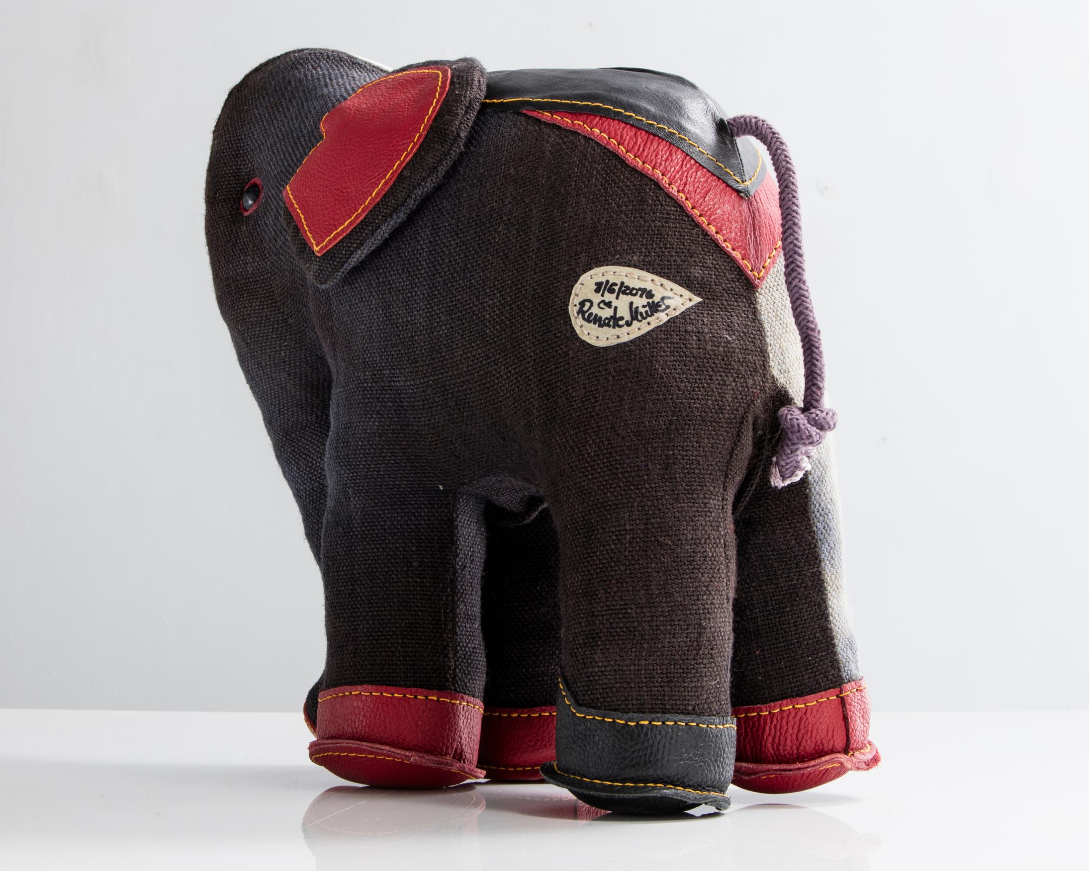 Therapeutic Toy Elephant in jute and red and black leather. Originally designed and made by Renate Müller for H. Josef Leven, Sonneberg, Germany, 2016.
 