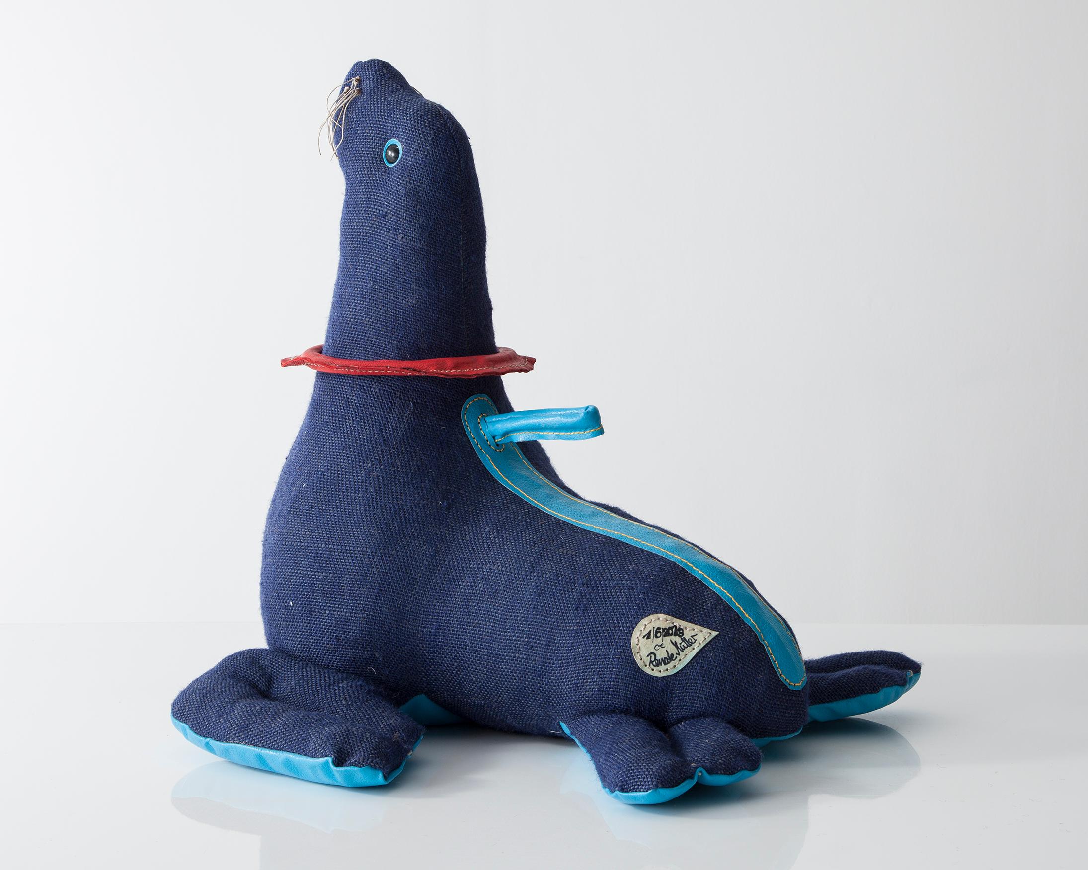 Therapeutic toy seal in dark blue jute with colored leather detailing. Designed and made by Renate Müller, Germany, 2013.
 