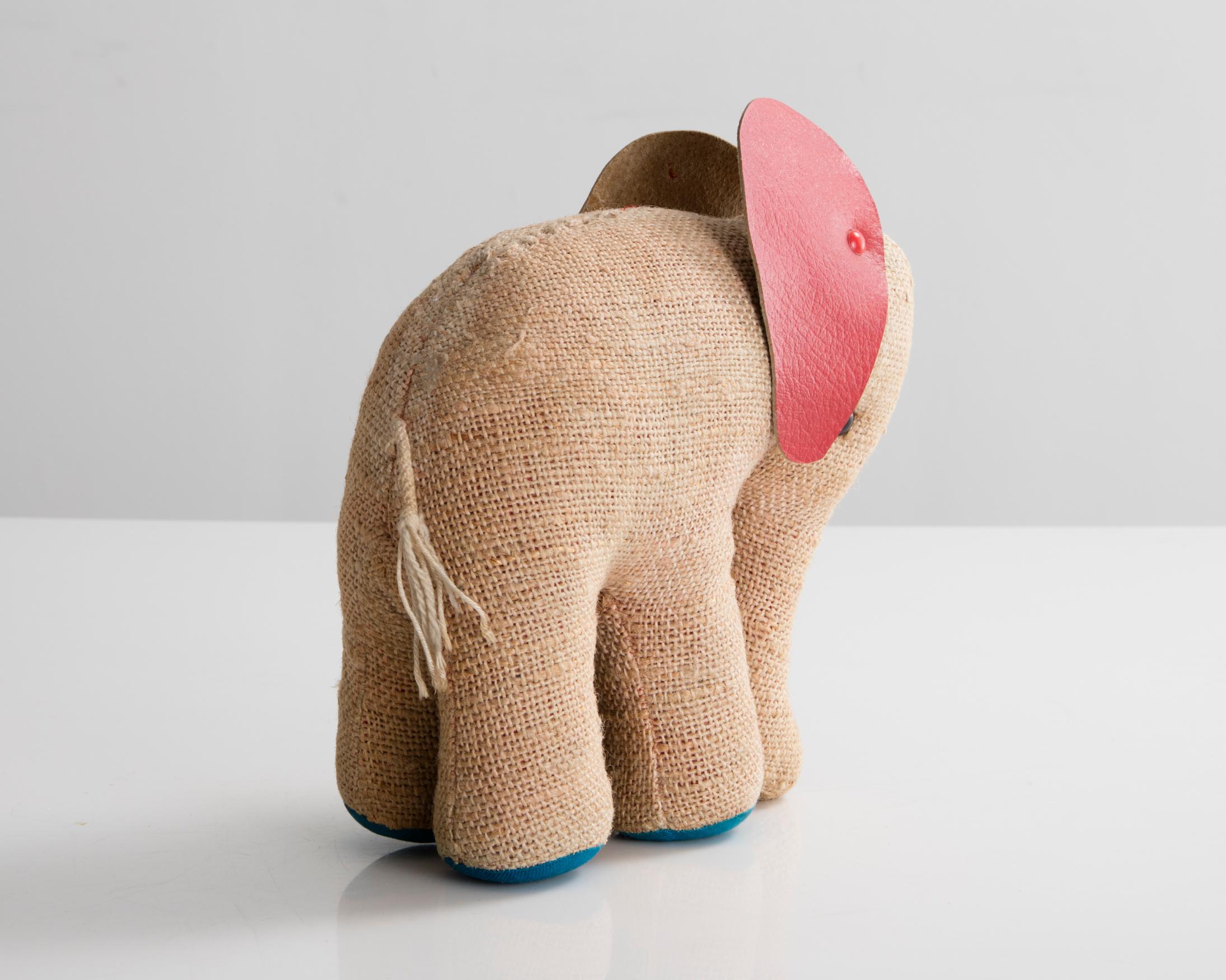 Therapeutic toy small elephant in jute and leather. Originally designed and made by Renate Müller for H. Josef Leven, Sonneberg, Germany, circa 1969.
 