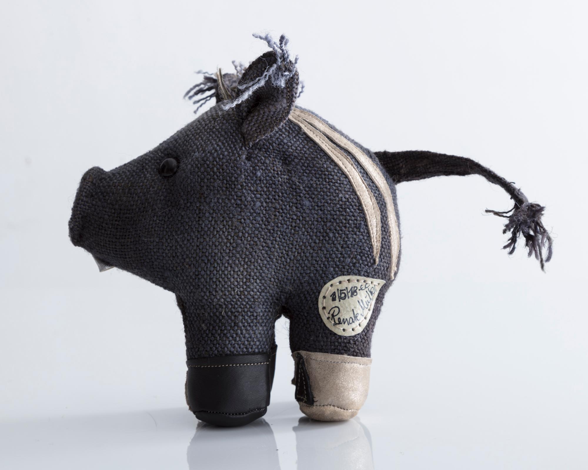 Therapeutic Toy Wild Boar in jute and leather, with plastic detailing. Designed and made by Renate Müller, Germany, 2018.