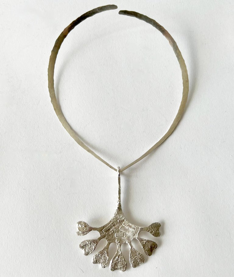 Textured sterling silver large scale pendant created by Theresia Hvorslev for Mema, circa 1972.  Pendant measures 3.5