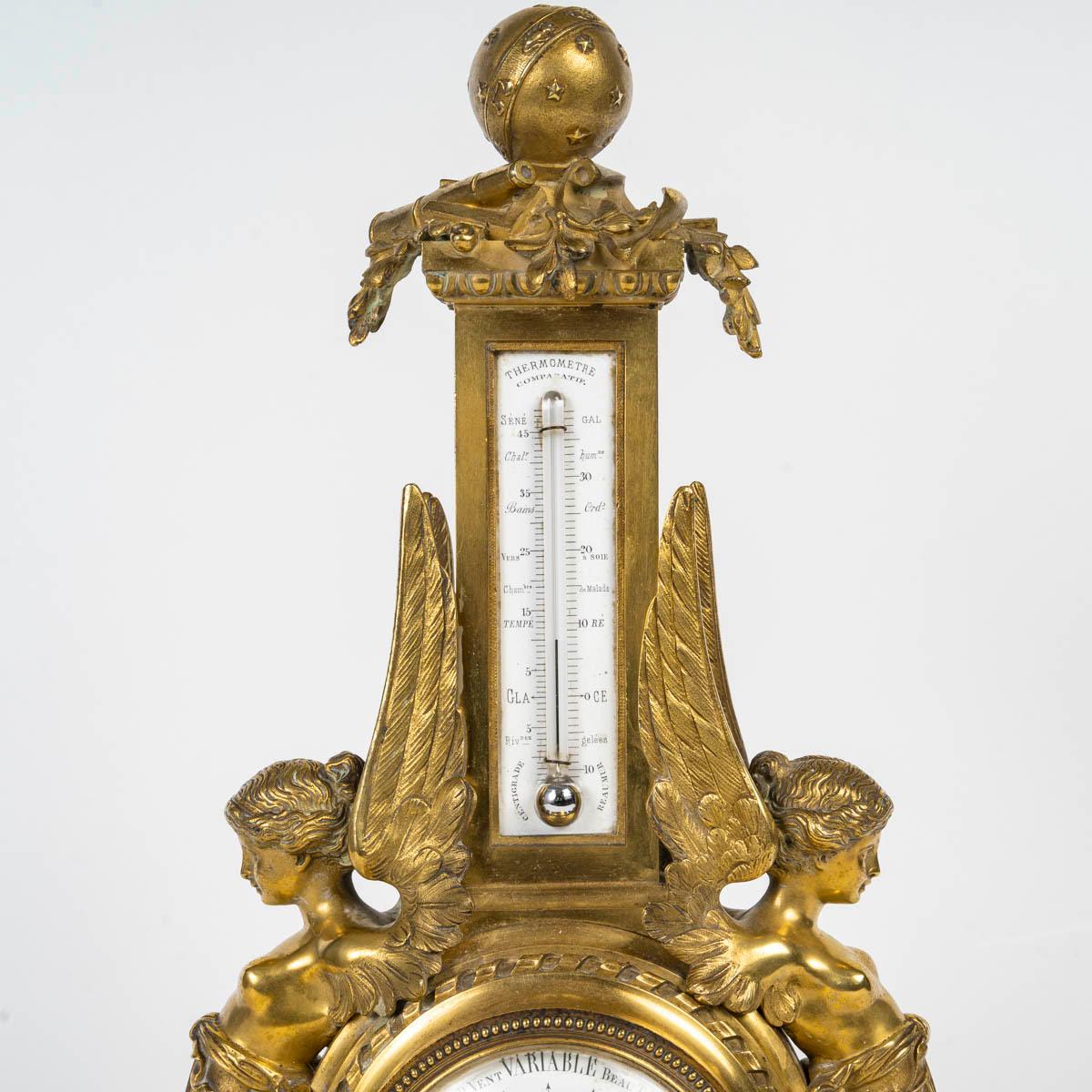 Termometro e barometro in bronzo dorato, periodo Napoleone III, XIX secolo.

Barometro e termometro in bronzo dorato del periodo di Napoleone III, decorato con donne alate, XIX secolo.
H. 39 cm. L: 18cm, P: 11cm