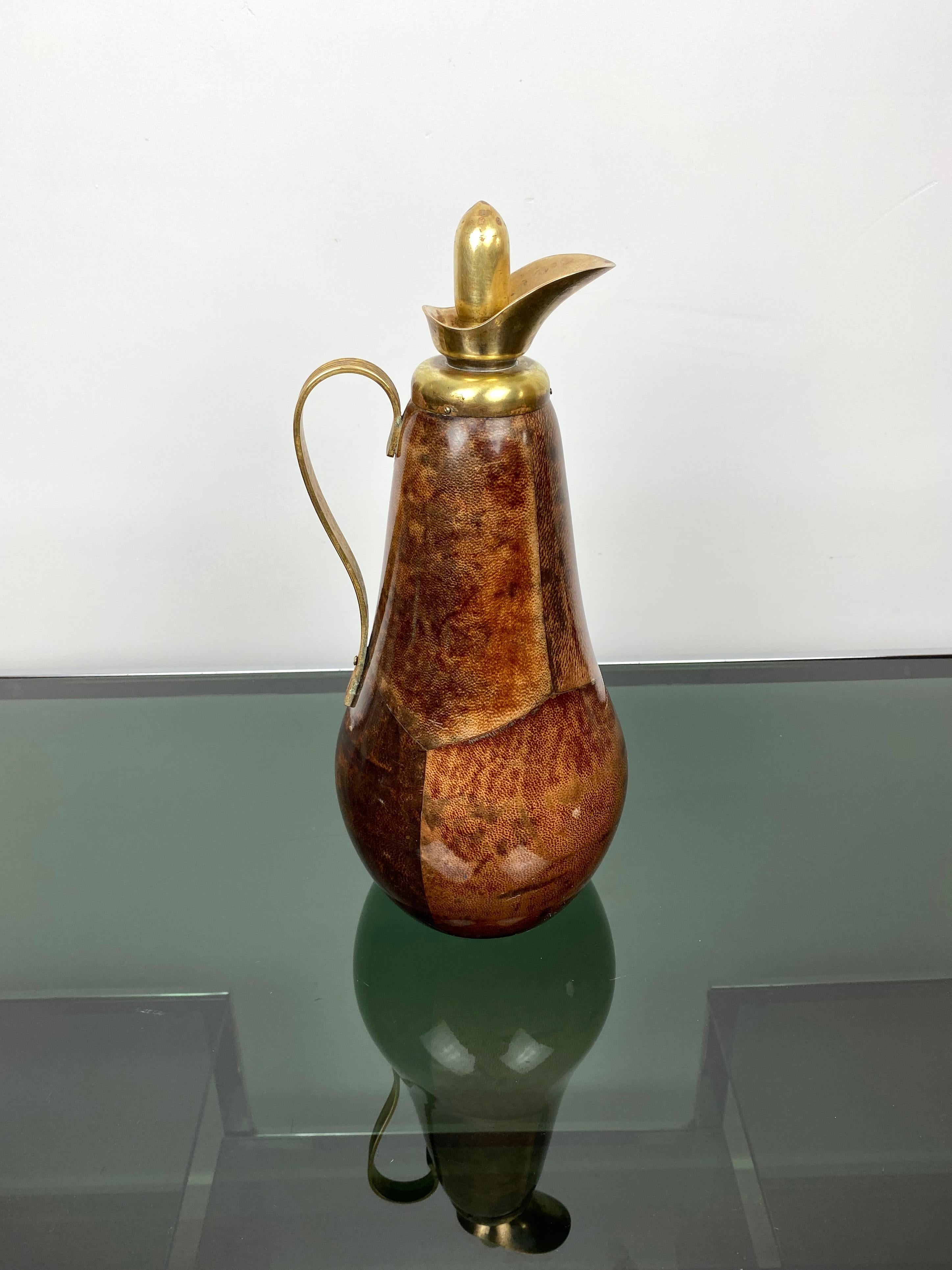 Thermos bottle in brown goatskin and brass by the Italian designer Aldo Tura, circa 1960.