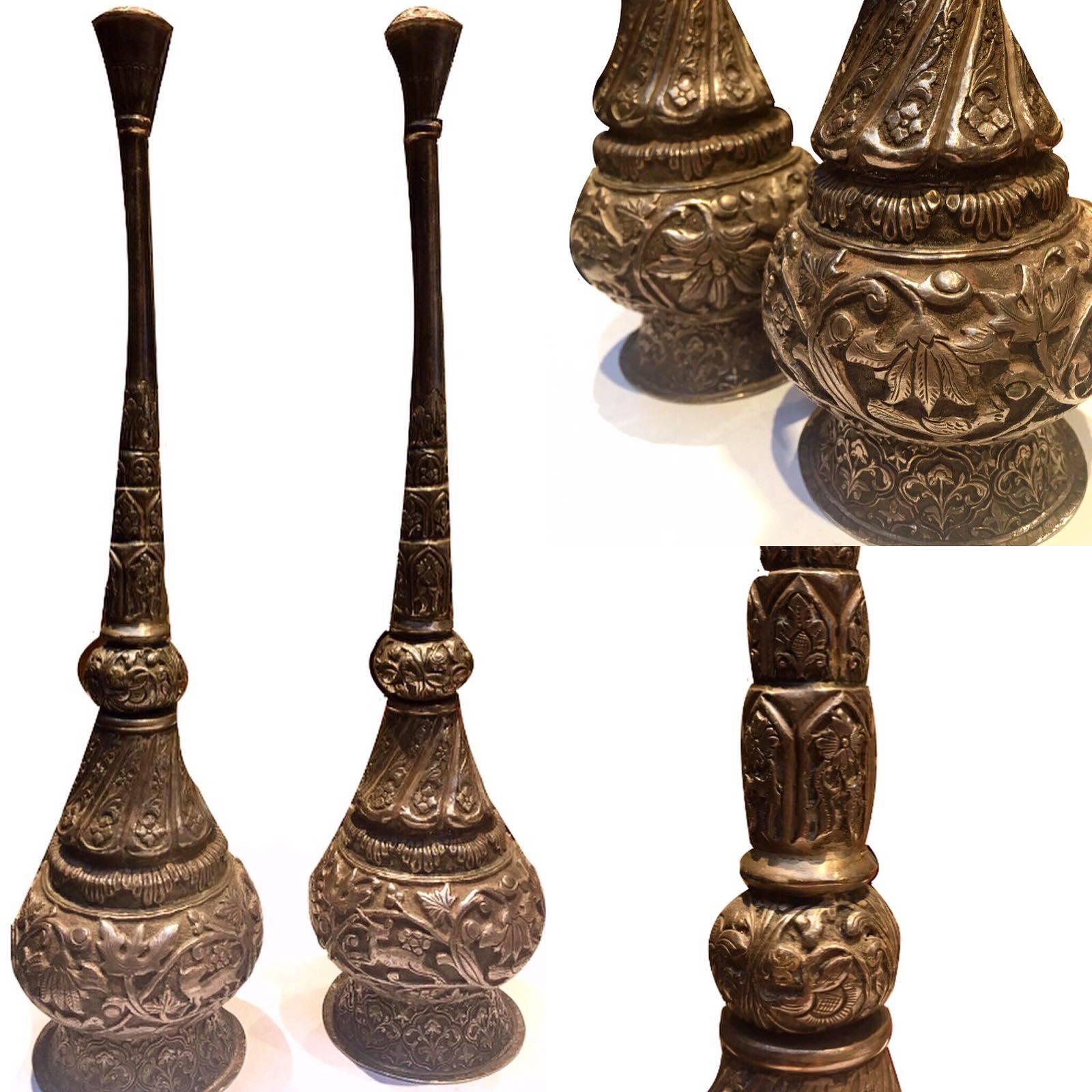 These 19th century, Indian silver rose water sprinklers. Used to spray rose water on the guests at the entrance, or for special occasions like marriage. 

Weight: 670 grams.