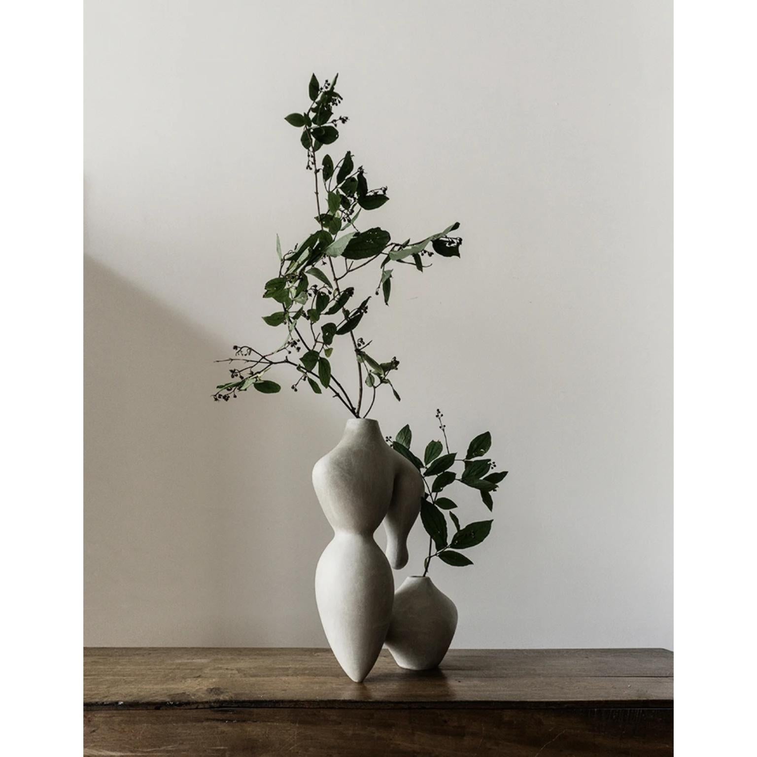 Thesium vase by cosmin florea.
Unique piece.
Dimensions: W 40 x D 15 x H 50 cm.
Materials: Stoneware.

Inspired by my love for pristine nature, this sculptural vase channels the shape of a dove.
Handcrafted in white stoneware, the Dove vase