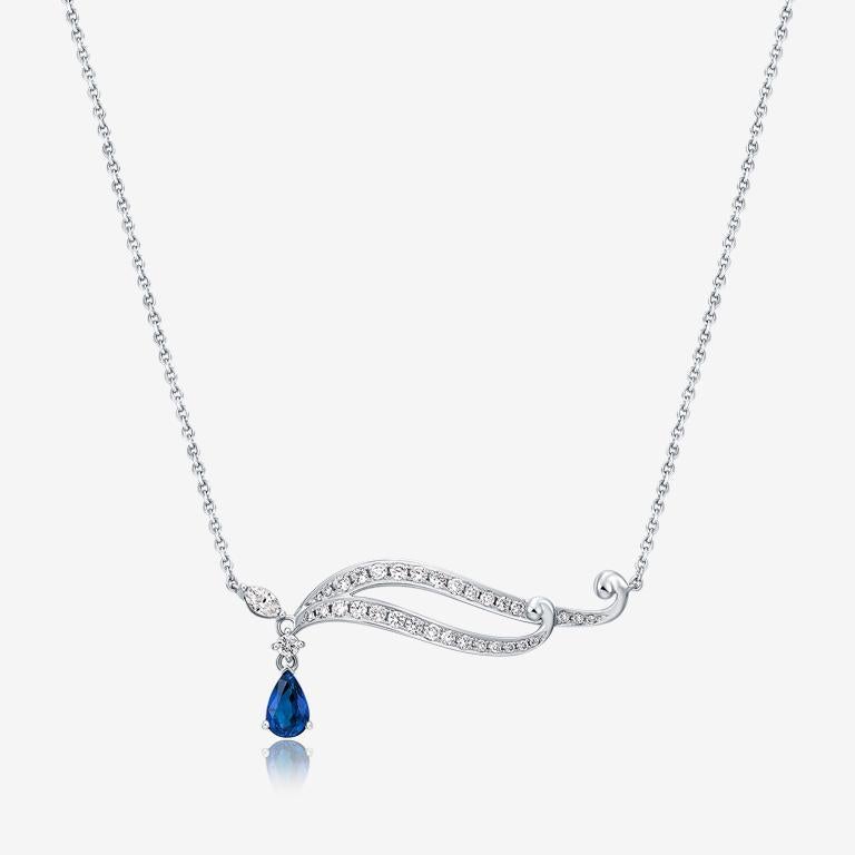 About the collection
The Datura Astra collection is inspired by the whimsicality and playfulness of nature.

Product description
A playful curved necklace features brilliant-cut diamonds that that slope to  a bold pear-cut sapphire.

Additional
