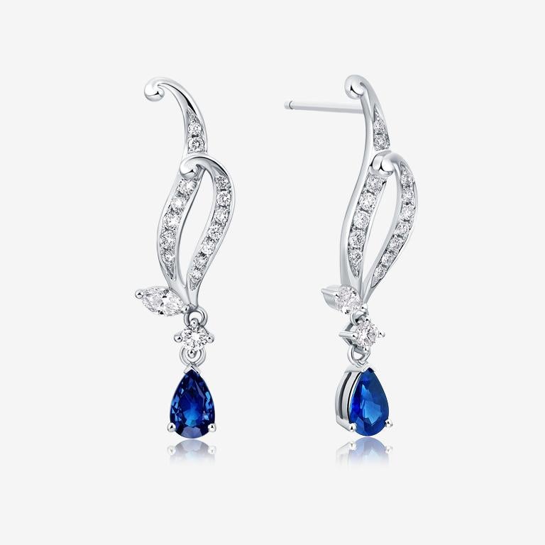 About the collection
The Datura Astra collection is inspired by the whimsicality and playfulness of nature.

Product description
An elegantly curved earring features brilliant-cut diamonds and joining horse-eye diamonds that slope to bold pear-cut