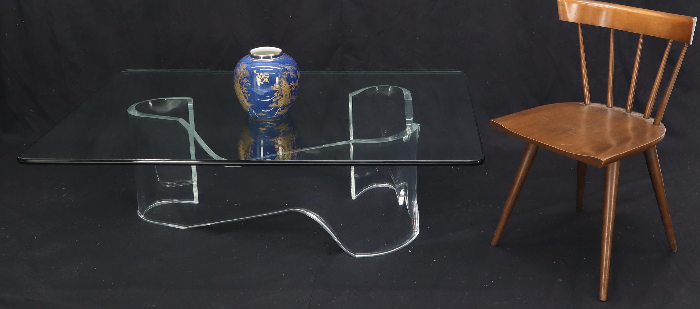 Mid-Century Modern thick Lucite and glass top organic shape coffee table.