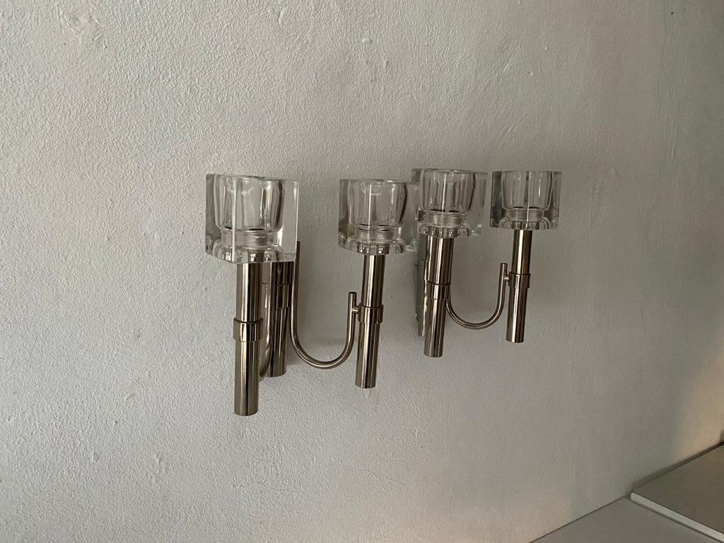 Thick cube glass & chrome pair of sconces by Peill & Putzler, 1970s, Germany

Elegant rare high quality wall lamps.

Lamps are in very good vintage condition.
Wear consistent with age and use

These lamps works with E14 standard light bulbs.