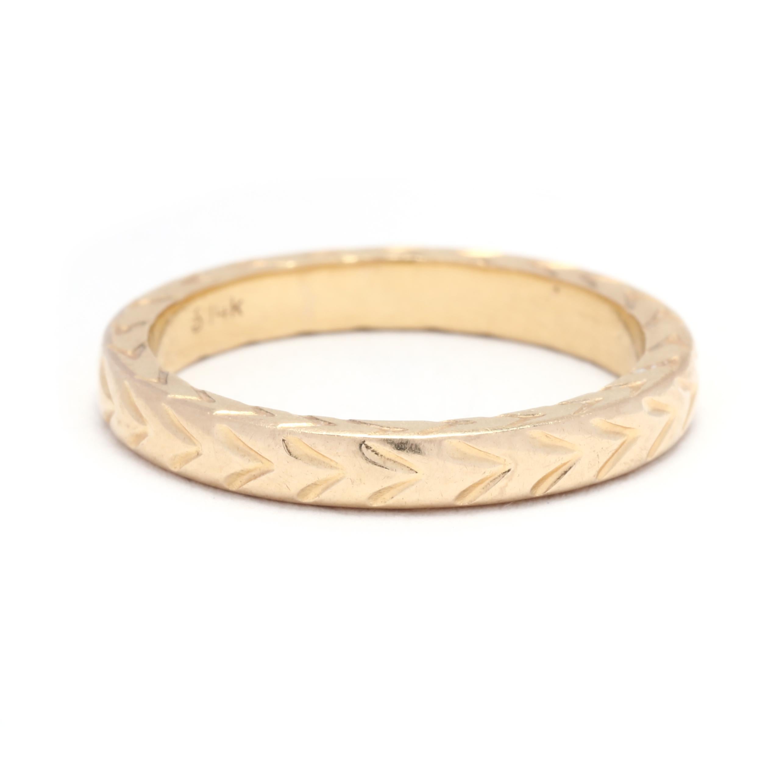 This stunning thick engraved stackable band is the perfect accessory for adding a touch of elegance and style to your look. Crafted in 14K yellow gold, the band features a unique engraved design that adds texture and depth. The ring is a size 5.75,