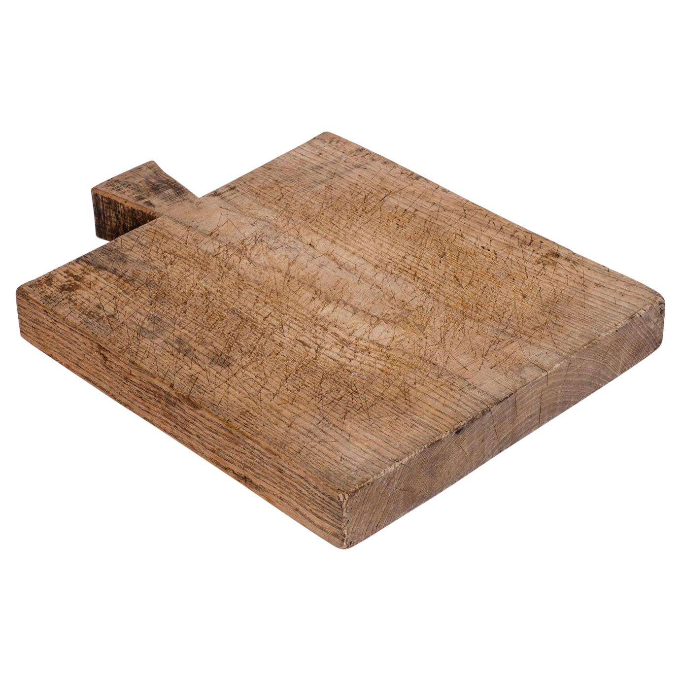 Thick French cutting board from the 19th century.