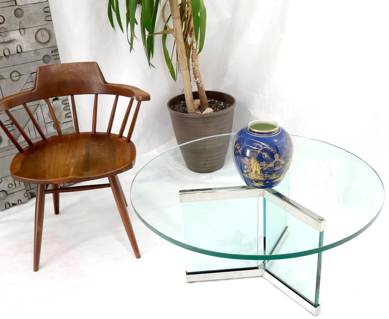Mid-Century Modern thick 3/4 glass and chrome tripod style base round glass top coffee table by Pace.