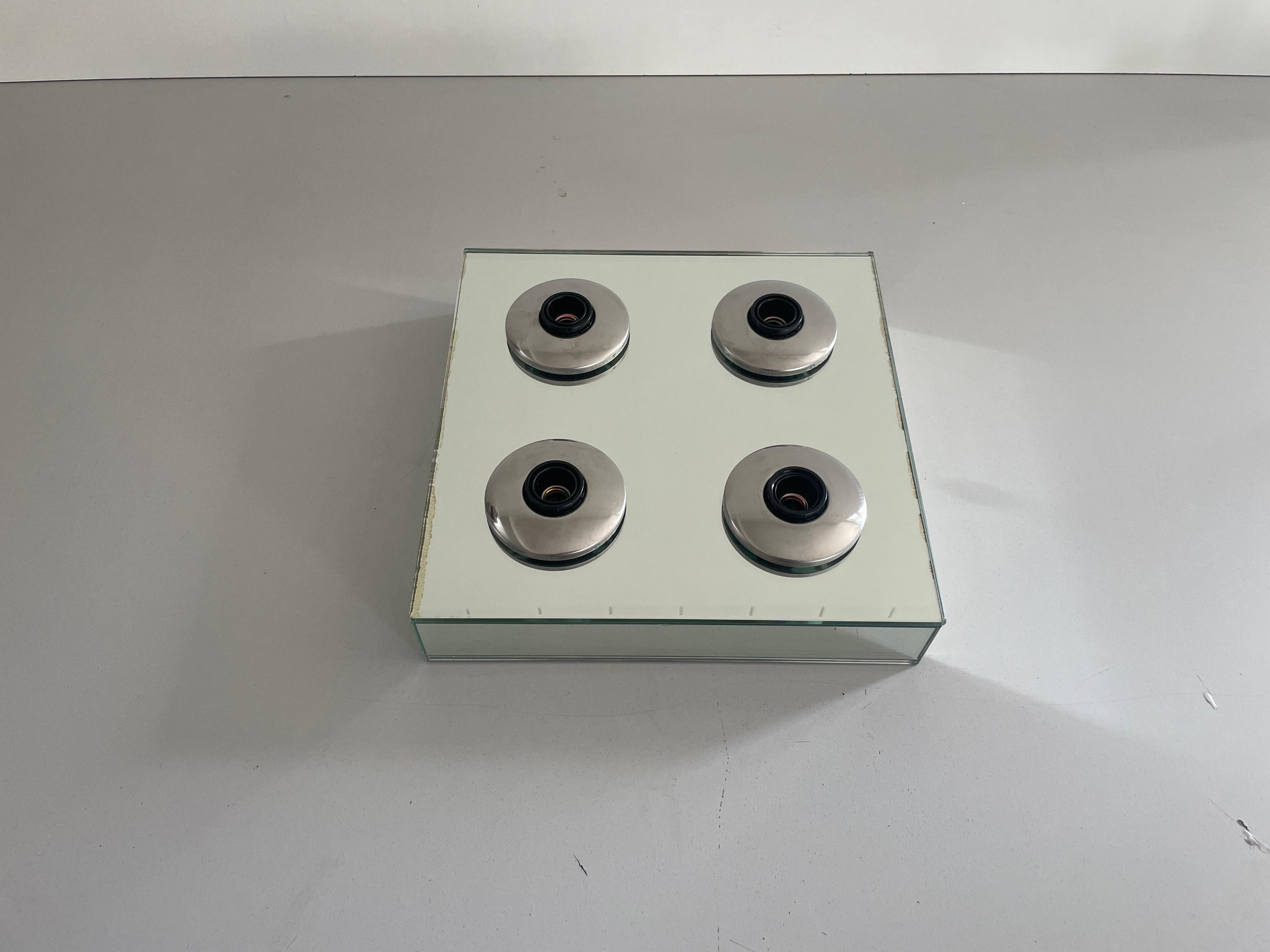 Thick Glass Square Design 4 Socket Flush Mount Light by Luci, 1960s, Italy

Lampshade is in very good vintage condition.

This lamp works with 3x E14 light bulbs. 
Wired and suitable to use with 220V and 110V for all