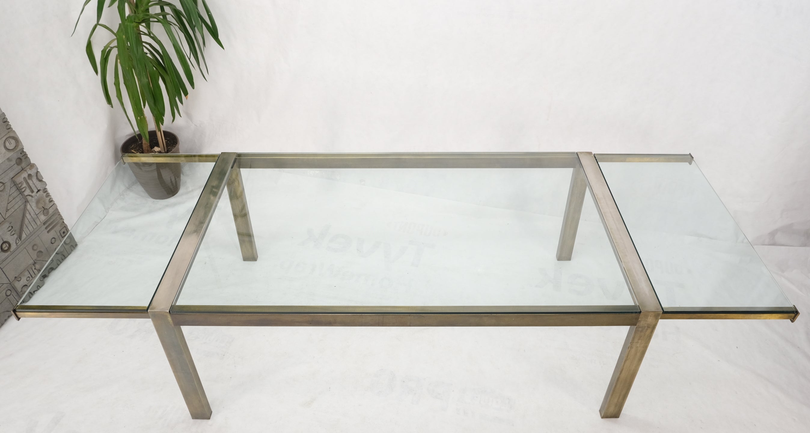 Thick glass top metal bronze finish frame dining table w/ 2 x 20