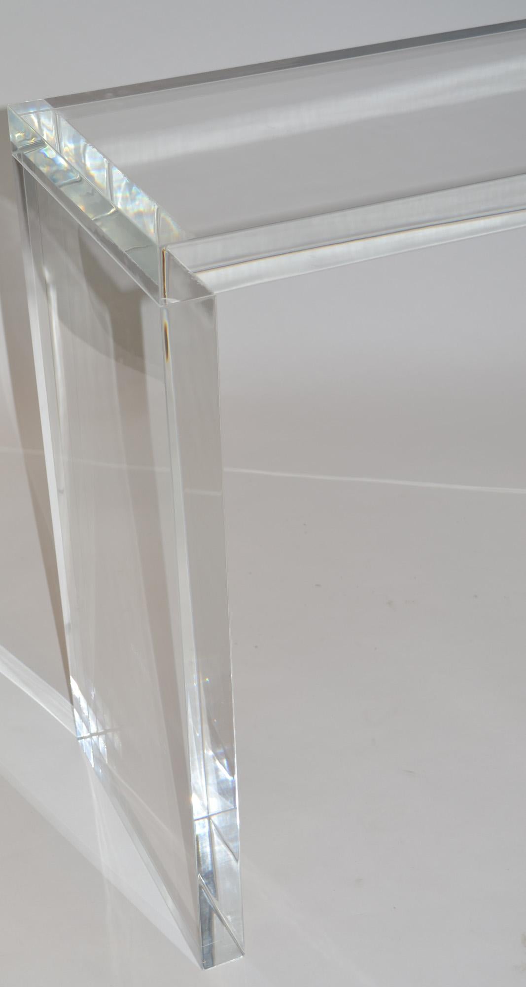 Thick slab Lucite console table of Minimalist design. 2