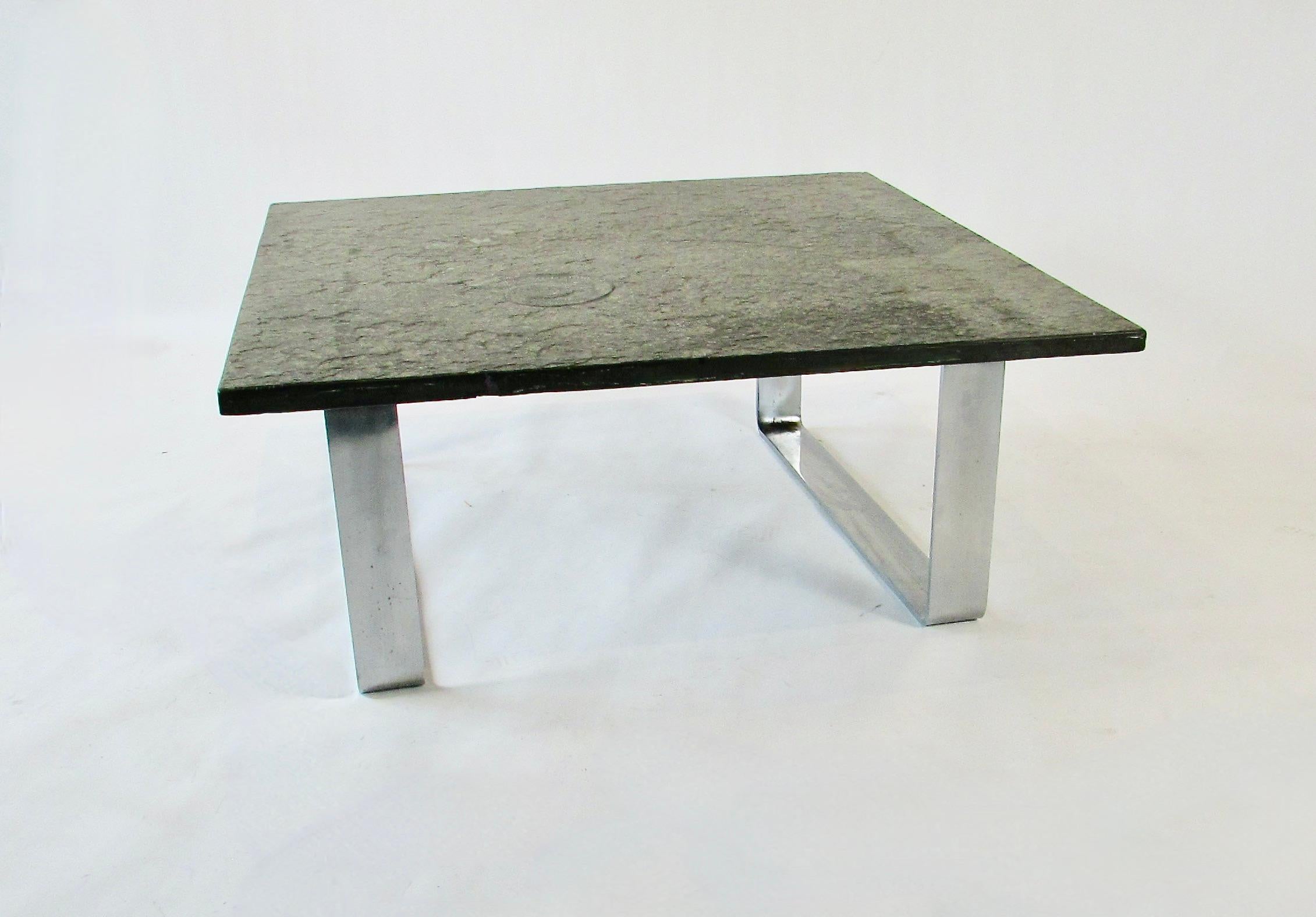 Brutalist Thick slate top table with Ammonite fossil on chrome base For Sale