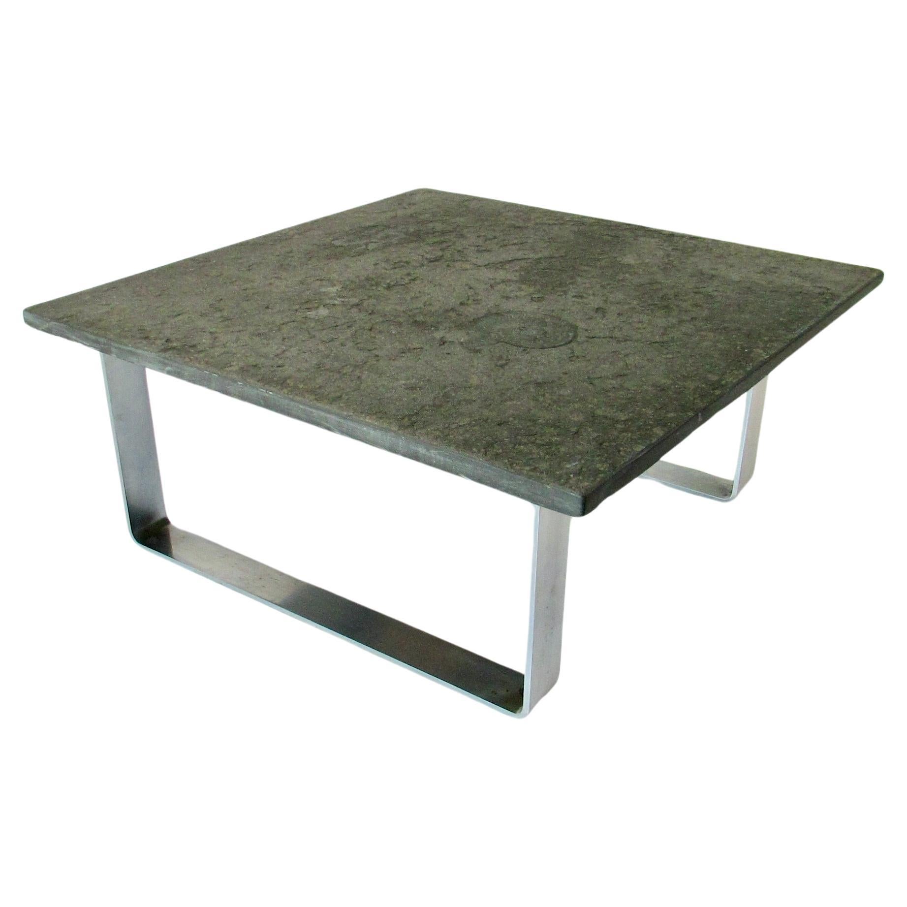 Thick slate top table with Ammonite fossil on chrome base For Sale