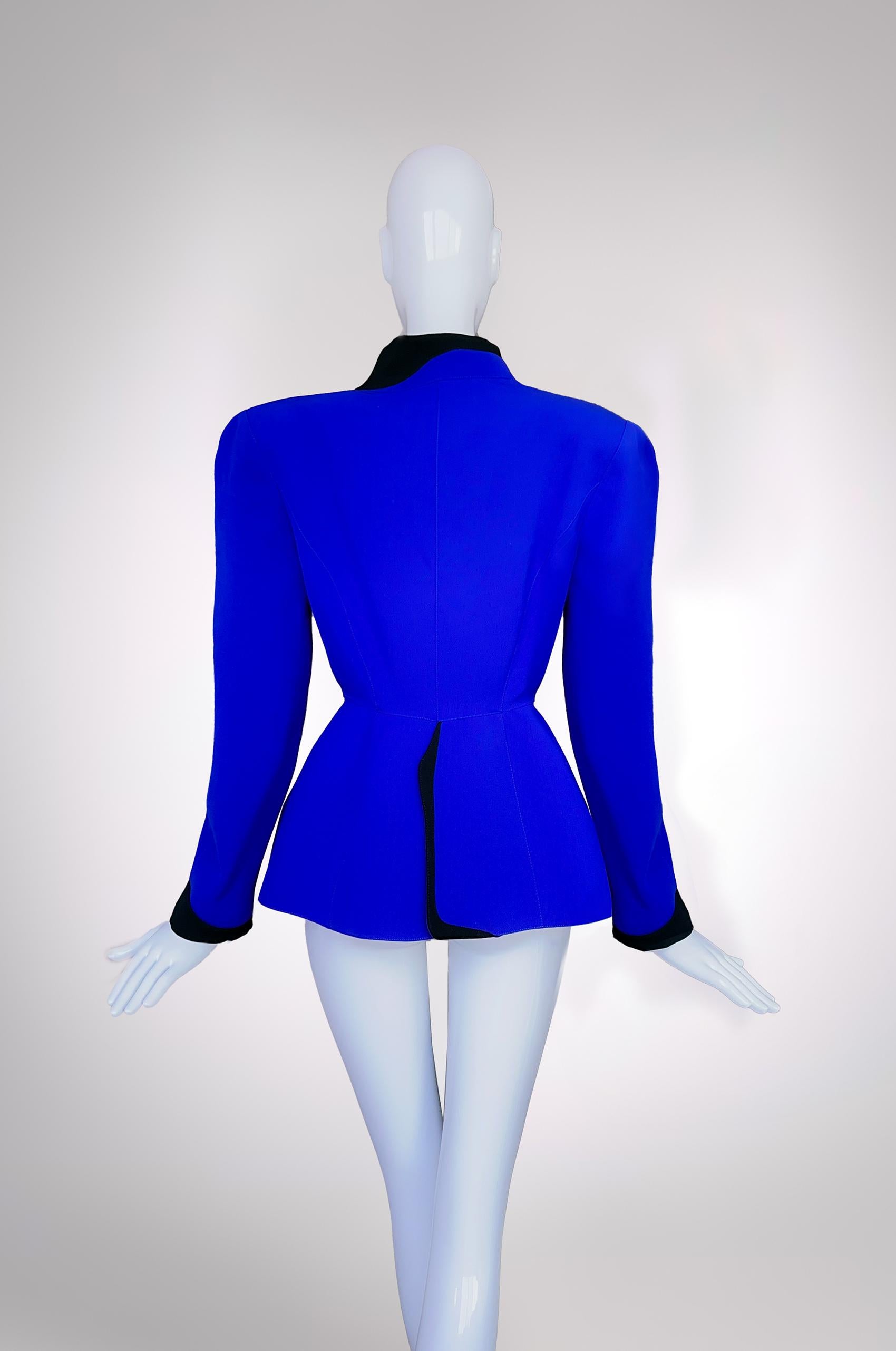 Extremely rare Colelctors Piece
Archival Thierry Mugler Jacket, 1987 Collection (categorized by Fashion Institute of Technology NYC).
A truly fabulous piece! Typical Thierry Mugler hyper feminine silhouette with fitted waist and stunning