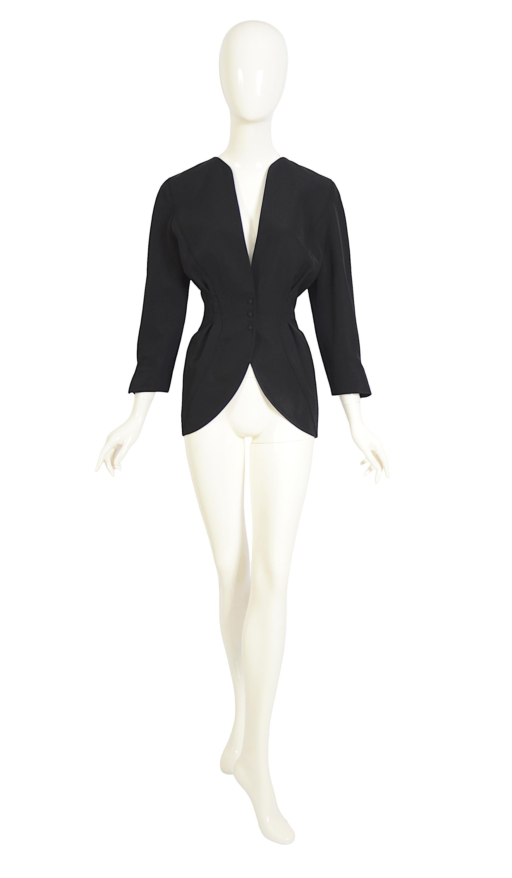 Vintage Thierry Mugler Black Jacket (1990s)
A classic Thierry Mugler piece from the early 90s, 
Made in France. 
100% wool
French size 38 
Please check the measurements for the best fit. 
Ua to Ua 19inches/48,5cm(x2) - Waist 14,5inches/37cm(x2) -