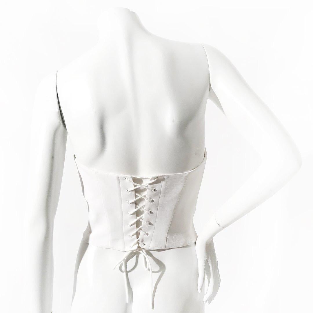 Anchor corset by Thierry Mugler 
Circa 1980s
Boning in corset 
V-cut bust 
Lace-up back closure
Made in France
Condition: Excellent vintage condition, little to zero visible wear. (see photos) 

Size/Measurements: (approximate, taken flat) 
Size: