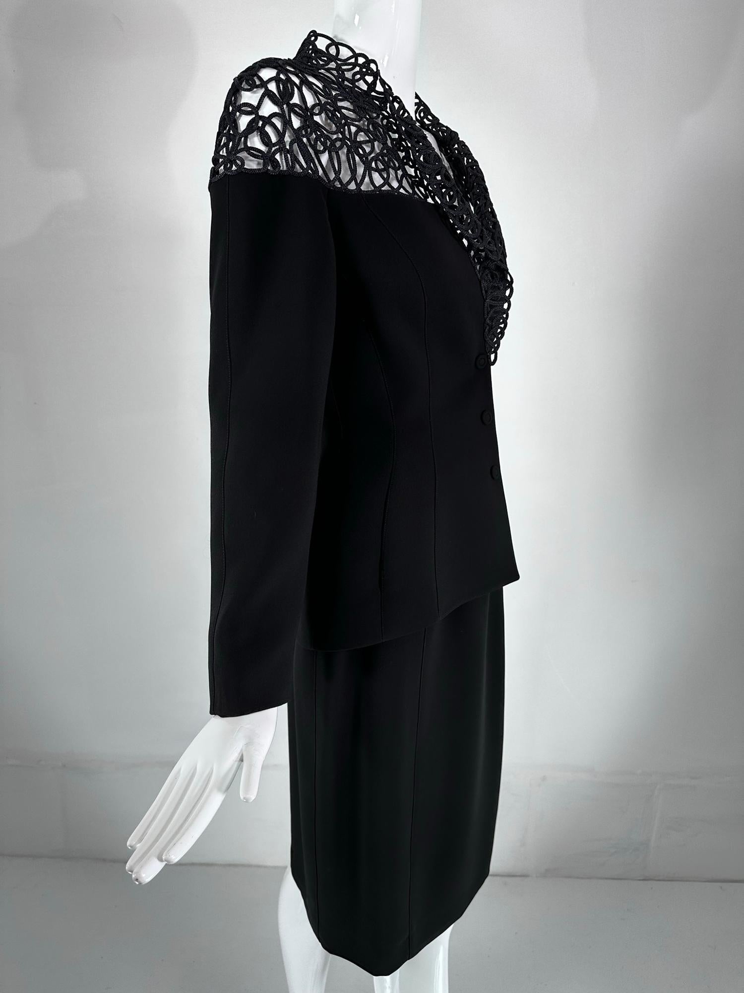 Thierry Mugler Black cord lace jacket & matching skirt from the 1980s, looks barely, if ever, worn. Fitted jacket features black cord open work lace at the collar & lapels plus the shoulders front & back. The jacket is fine black wool gabardine. The