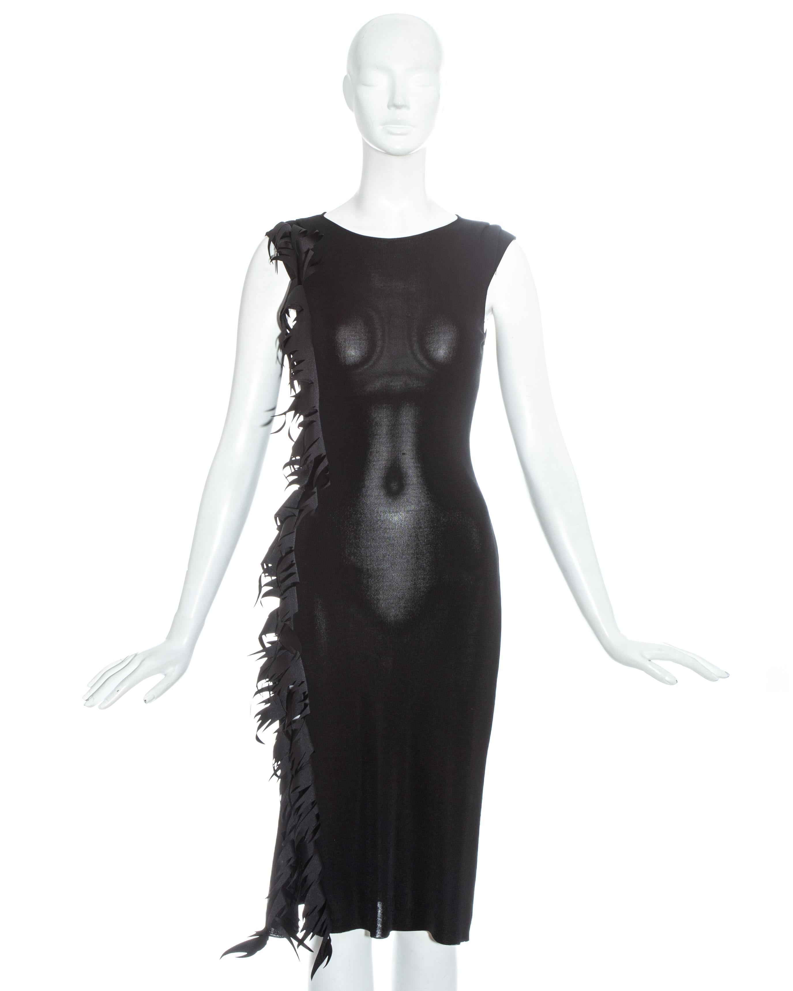 Thierry Mugler black rayon knit mid-length dress with fabric inset in the shape of flames on the right hand side

c. 1990