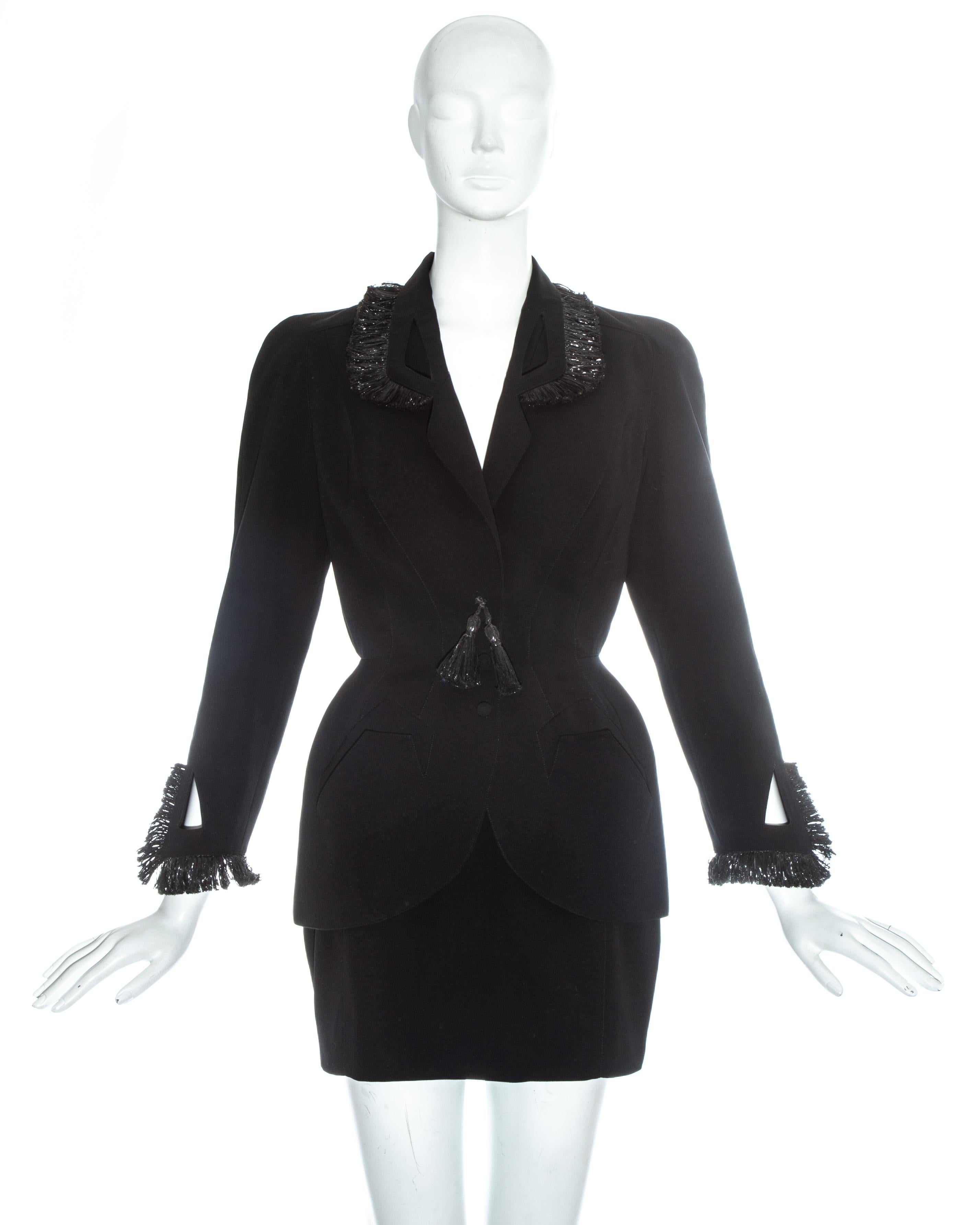 Thierry Mugler black wool mini skirt suit

- Blazer jacket with raffia trim, accentuated waist, and snap button closure
- High waisted matching mini skirt 

Spring-Summer 1995