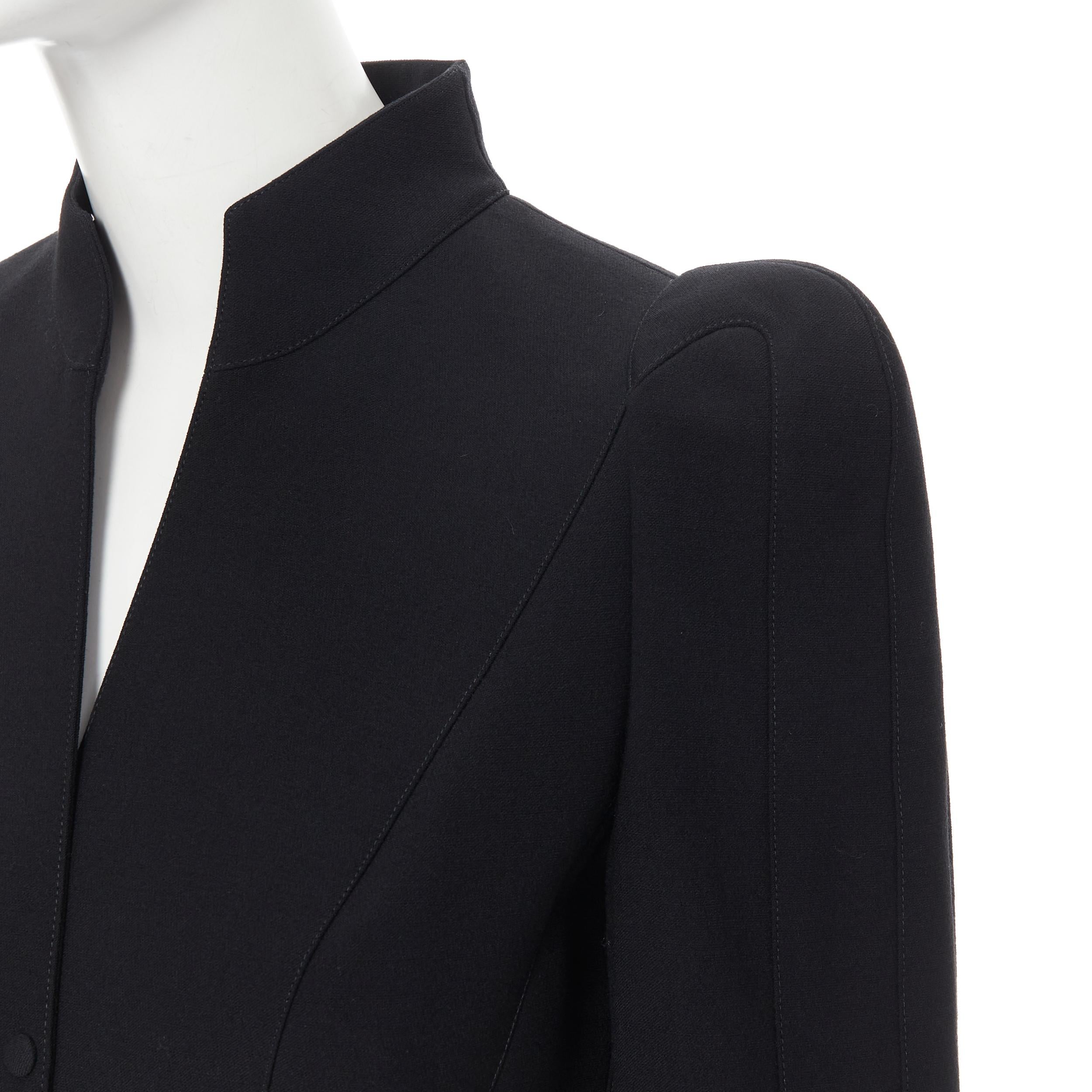 THIERRY MUGLER black wool peak shoulder fitted peplum blazer jacket FR38 S 
Reference: GIYG/A00053 
Brand: Thierry Mugler 
Designer: Thierry Mugler 
Material: Wool 
Color: Black 
Pattern: Solid 
Closure: Button 
Extra Detail: This blazer comes with