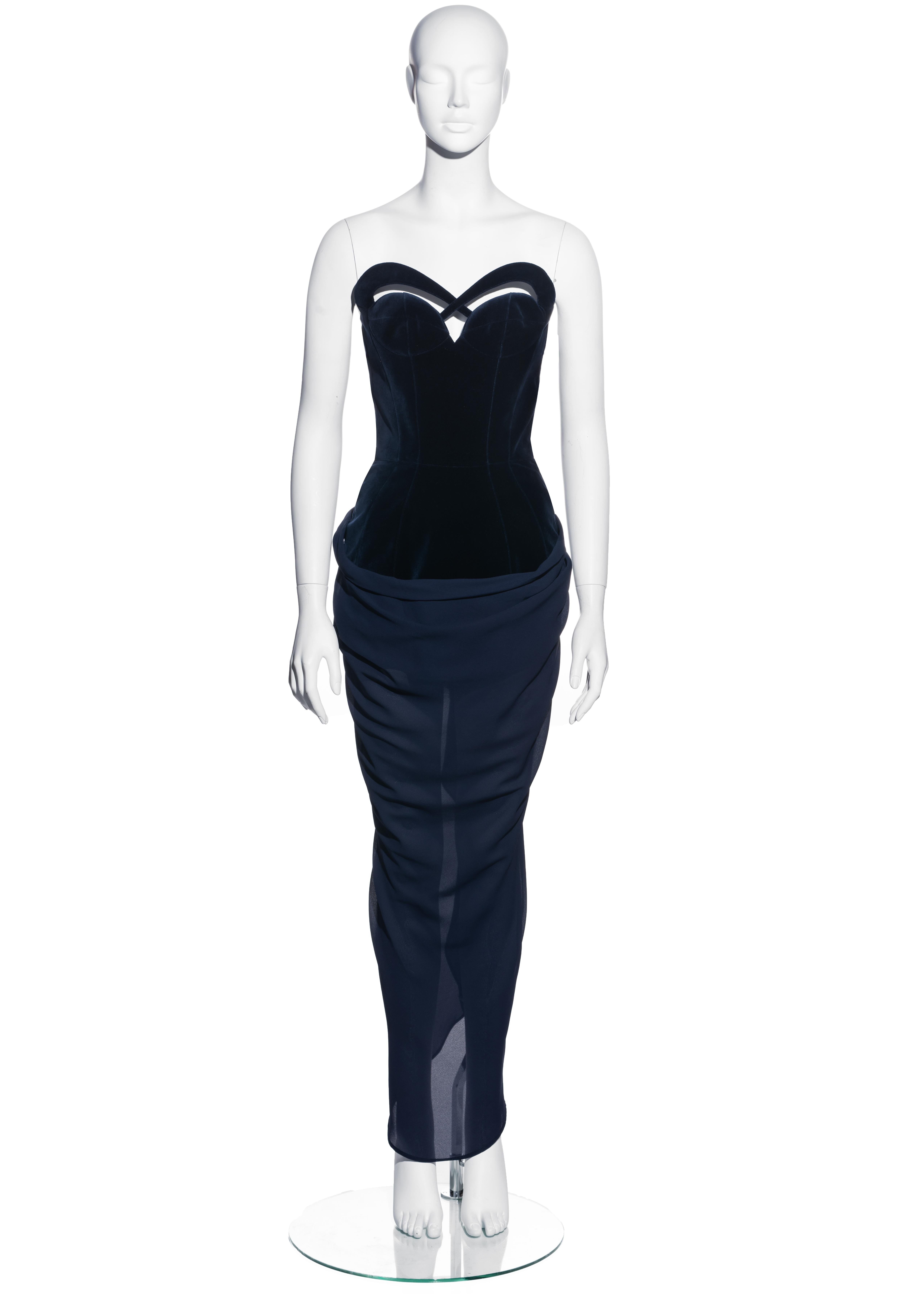 ▪ Thierry Mugler nachtblaues Korsett-Abendkleid
▪ Samtkorsett mit Ausschnitten 
▪ Eingebauter Body
▪ Drapierter Chiffon-Rock 
▪ Reißverschluss
▪ FR 36 - UK 8 - US 4
▪ Herbst-Winter 1998