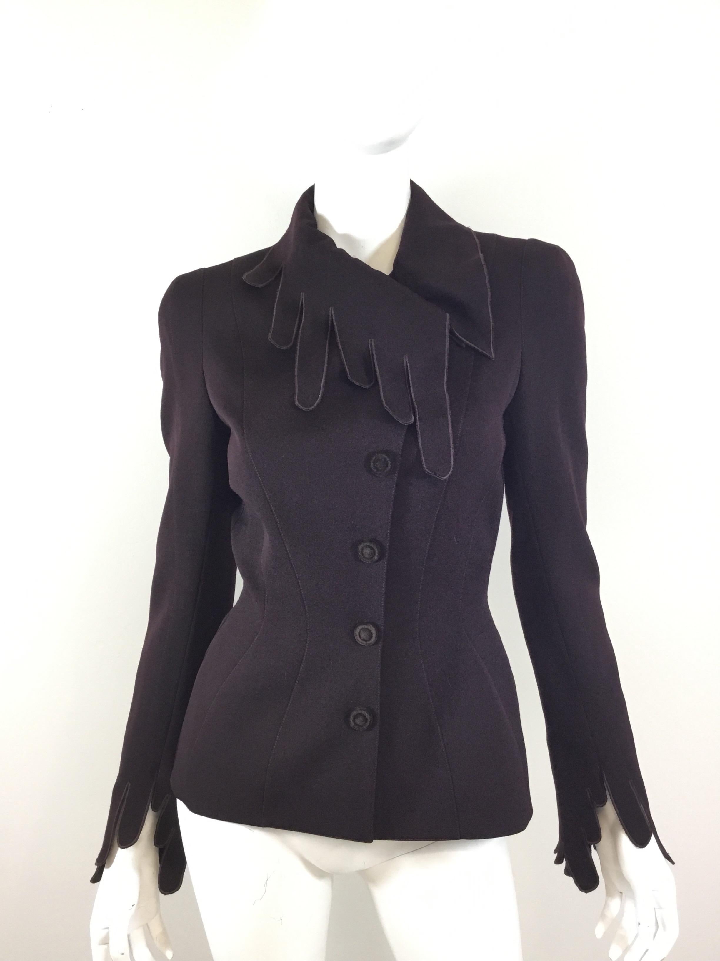 Thierry Mugler Suit with jacket and skirt (skirt is small and did not fit mannequin—see measurements + photos)

Jacket has a very unique detail along the trimming with velvet lining. Snap button closures and full lining. Labeled Size 36, 100%