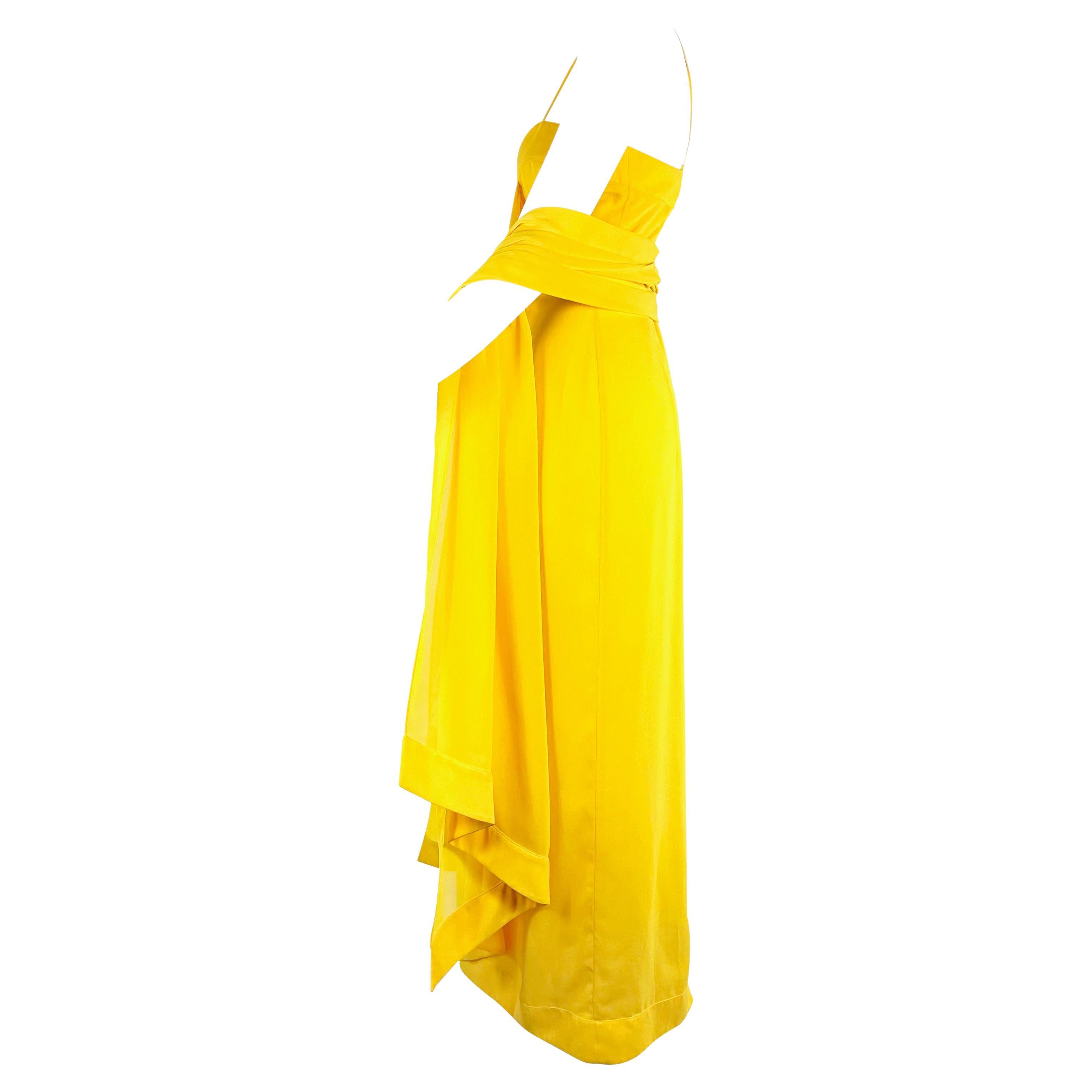 Presenting a gorgeous canary yellow chiffon Thierry Mugler gown with a matching shawl, designed by Manfred Mugler. From the Spring/Summer 2000 collection, this stunning dress features spaghetti straps with pleated detailing at the bust. A