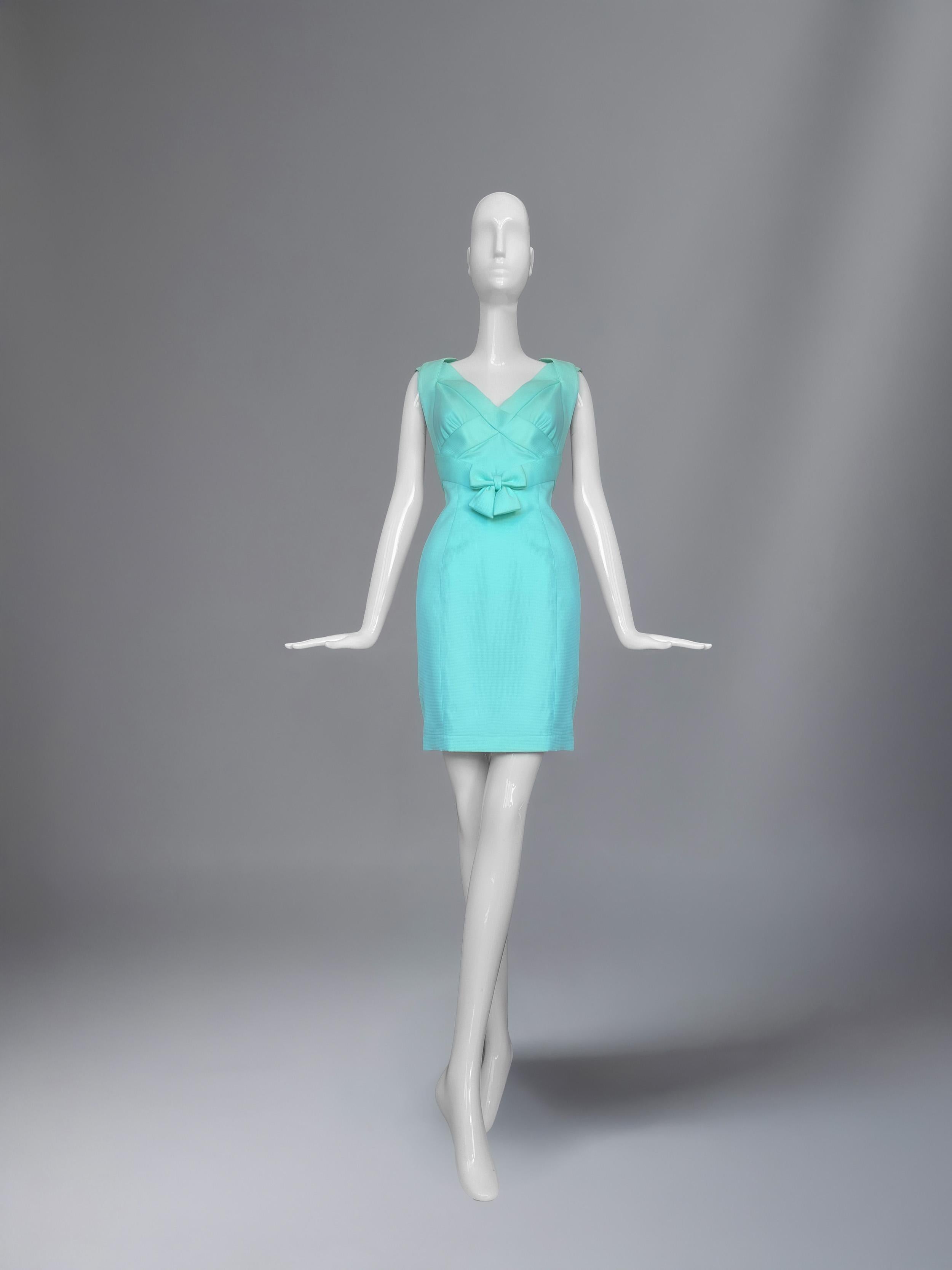If Tiffany & Co. were a dress, it would be this one! Thierry Mugler’s ode to sculptural femininity and crystalline allure. Cast in an exquisite shade of robin’s egg blue, the piece evokes the quiet opulence of a perfectly tied Tiffany ribbon, yet
