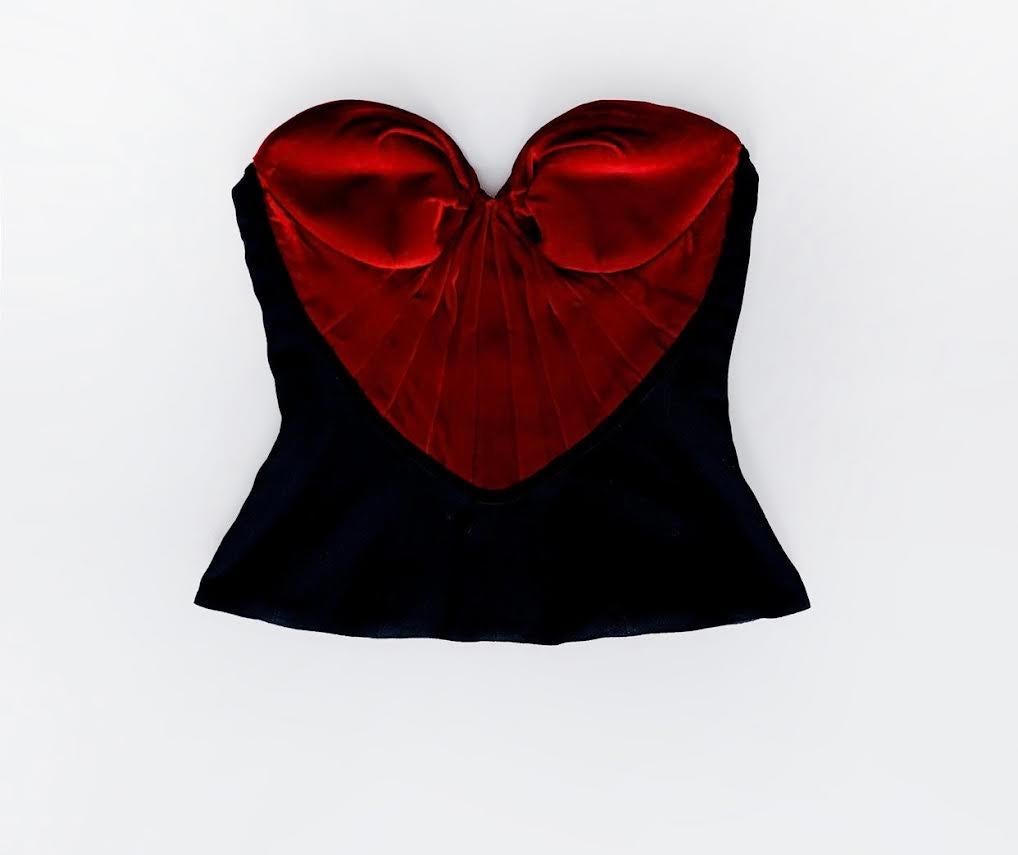 Thierry Mugler Corset Top w/ Red Velvet Heart Bustier, c.1990s
Thierry Mugler corset top, boned, with red velvet heart shaped bodice.
Zip closure at centerback.

Marked Size FR 42. 
Fits US Size 4 to 6 



