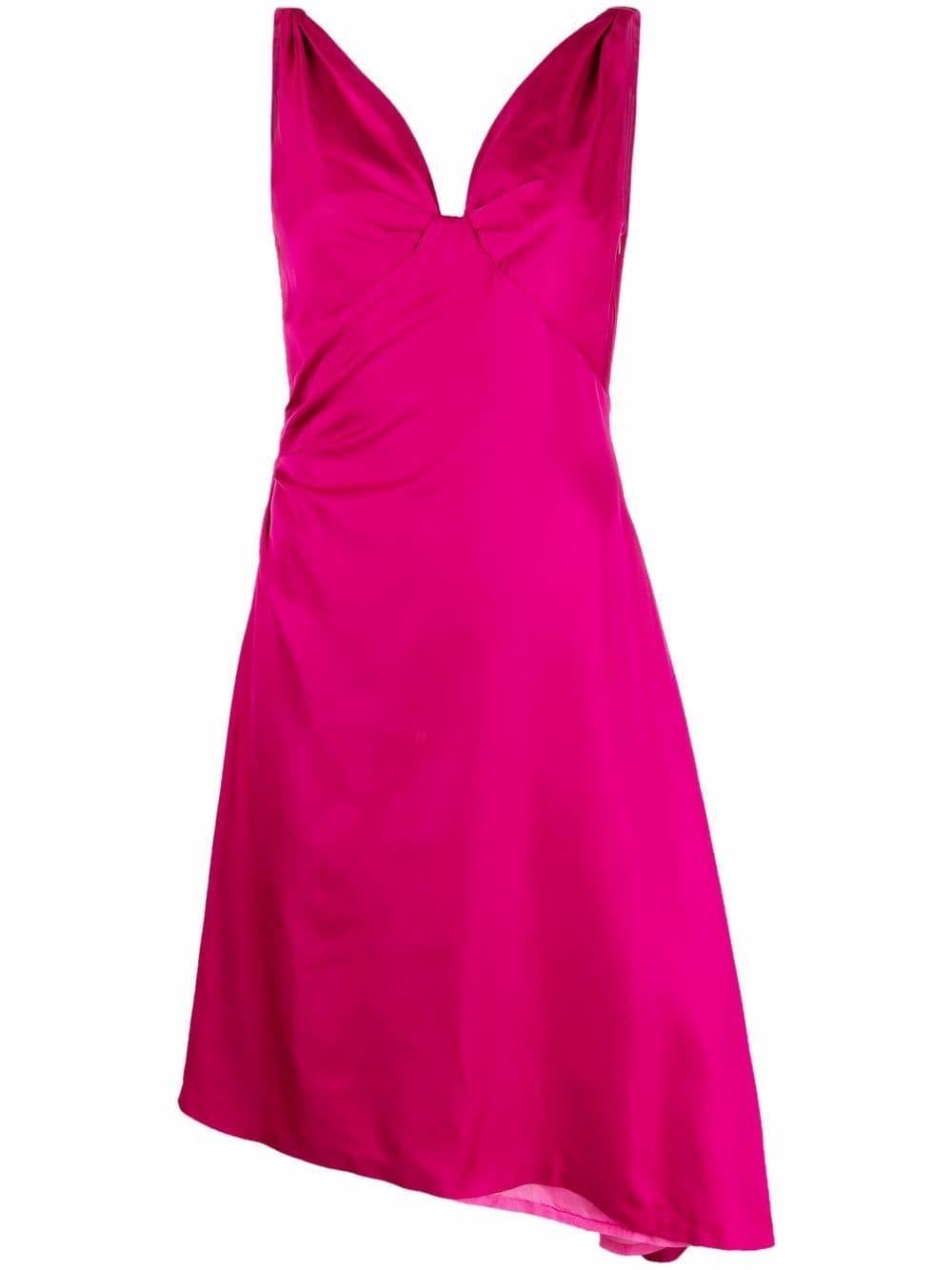 1980s Pink draped cocktail Thierry Mugler Couture dress featuring a knot detailing, an asymmetric hem, flared skirt, concealed side zip fastening.
In good vintage condition. Made in France.
Estimated size 36fr/ US4/ UK8
Polyamide 74%, Silk 26%
We