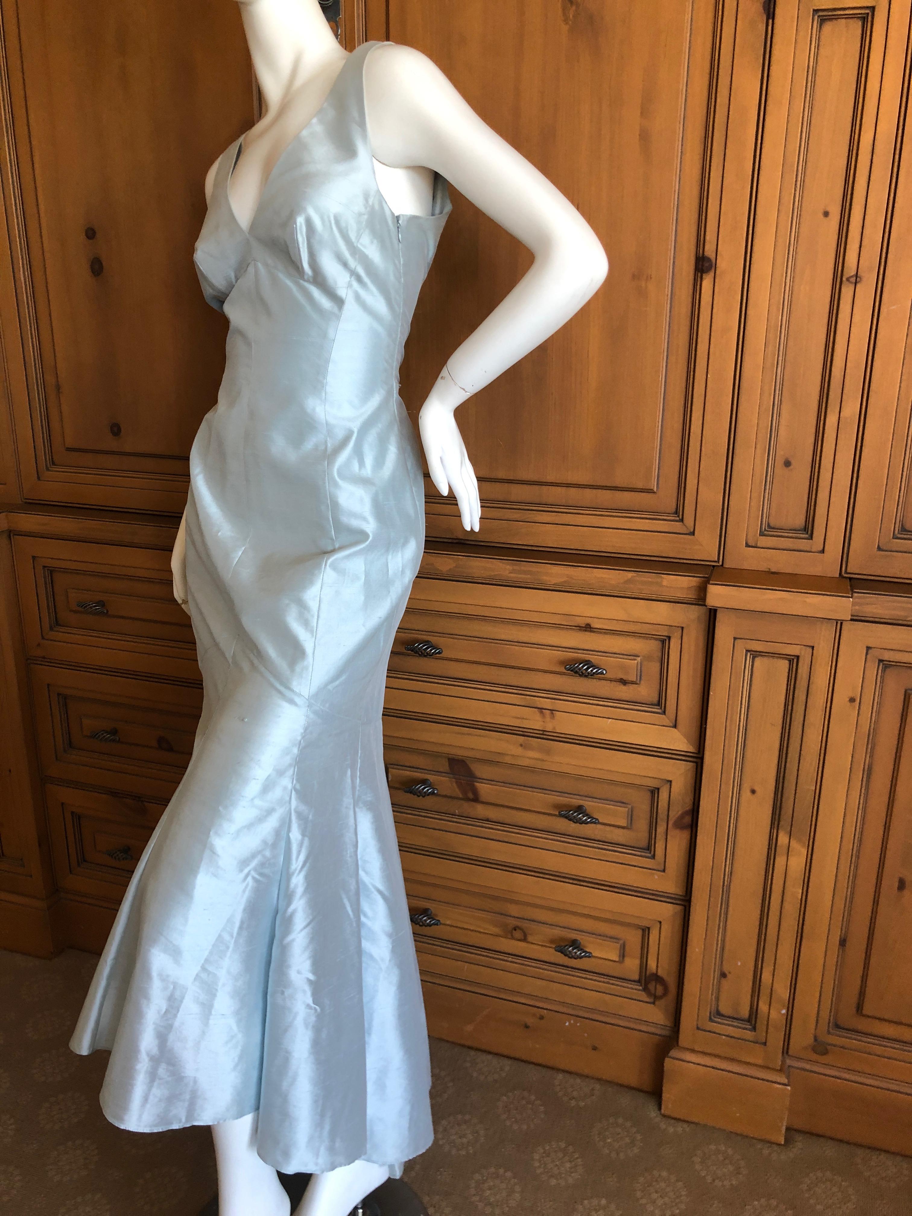 Thierry Mugler Couture Vintage 1980's Dupioni Silk Lace Up Back Evening Dress 
Beautiful baby blue dupioni silk evening dress with corset lacing and a high low hem, longer in the back.
Size 38
  Bust 36