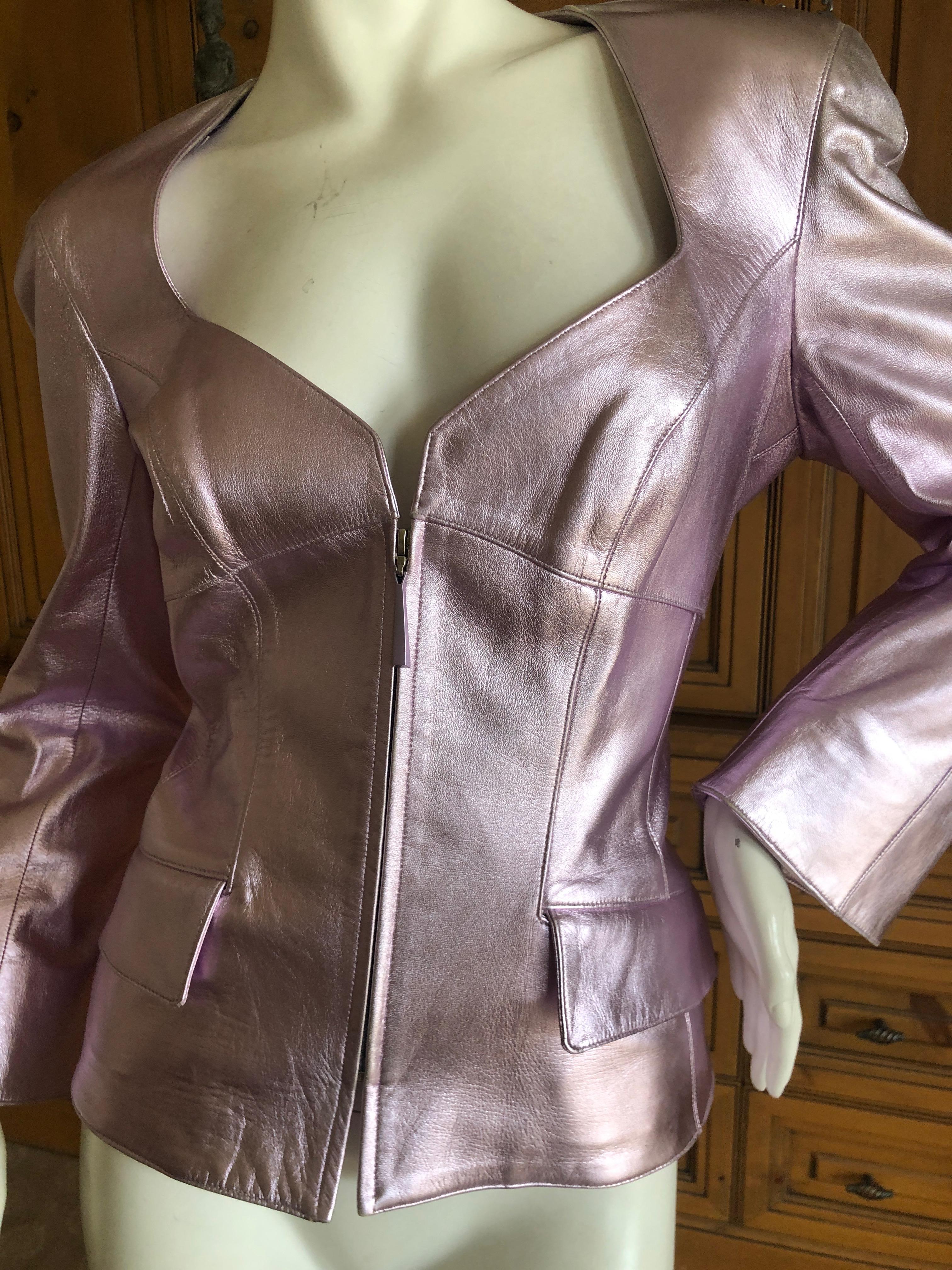 Vintage Lilac Metallic Silver Leather Jacket from THIERRY MUGLER<br />
This gorgeous Jacket is made of super luxe metallic lilac lambskin leather. Jacket is designed with sculptural details and Mugler's signature body hugging fit that cinches at the