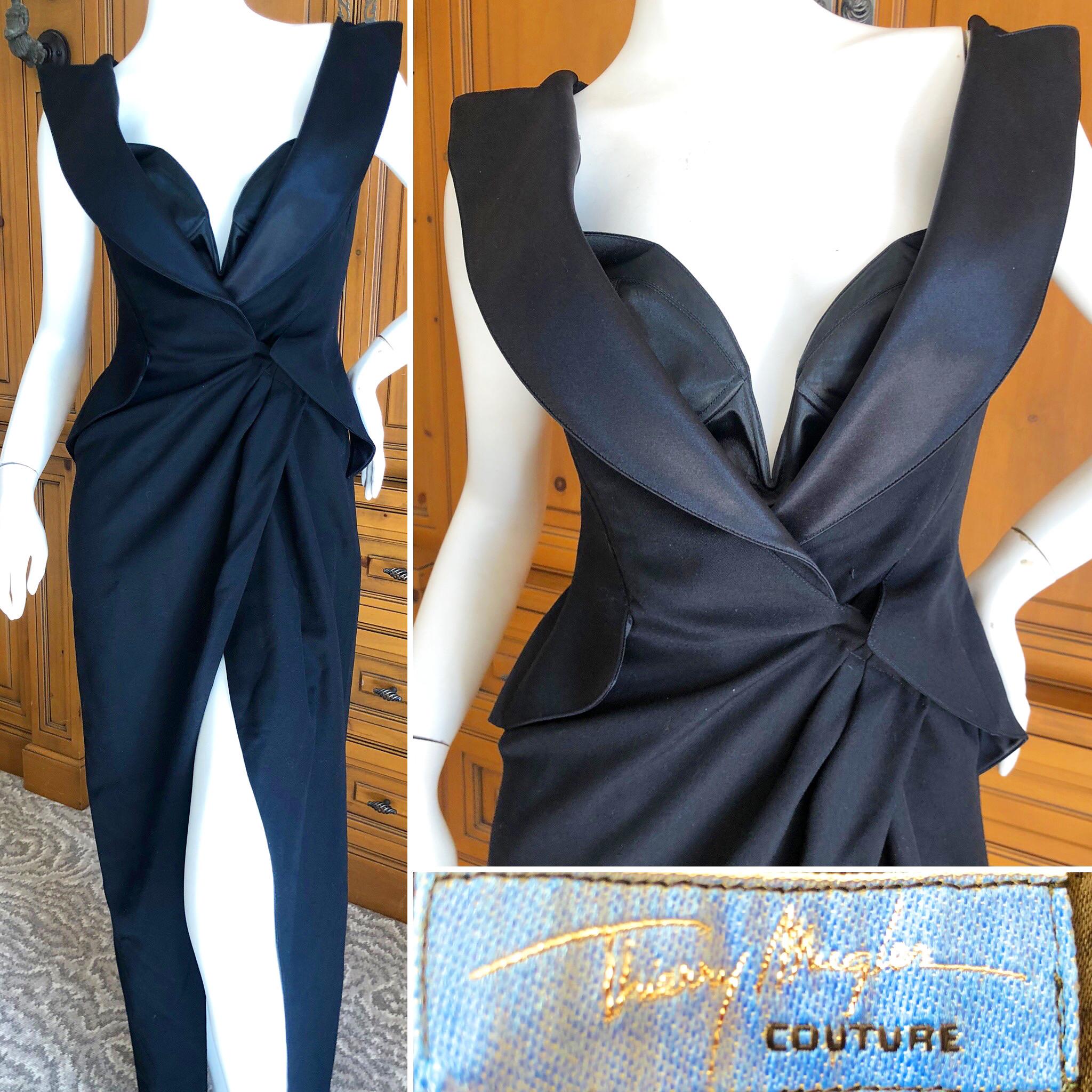 Thierry Mugler Couture 1980's Black Peak Lapel Tuxedo Dress with Separate Corset.
The corset is separate and can be worn with or without.
The corset snaps in place.
Apx Size 36-38
 Bust 34