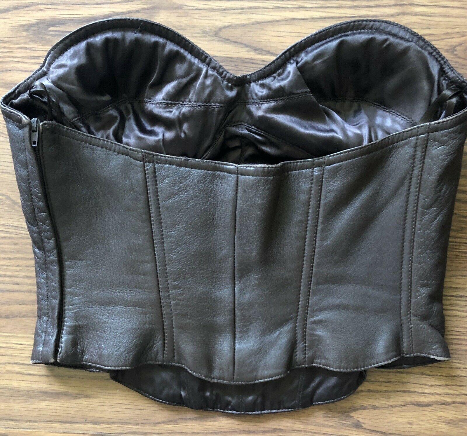 Thierry Mugler Couture Vintage Leather Bustier Top

Thierry Mugler leather cropped bustier top featuring concealed zip closure at side.

About Mugler:

Thierry Mugler's first collection, presented in 1973, was called Cafe de Paris and featured his