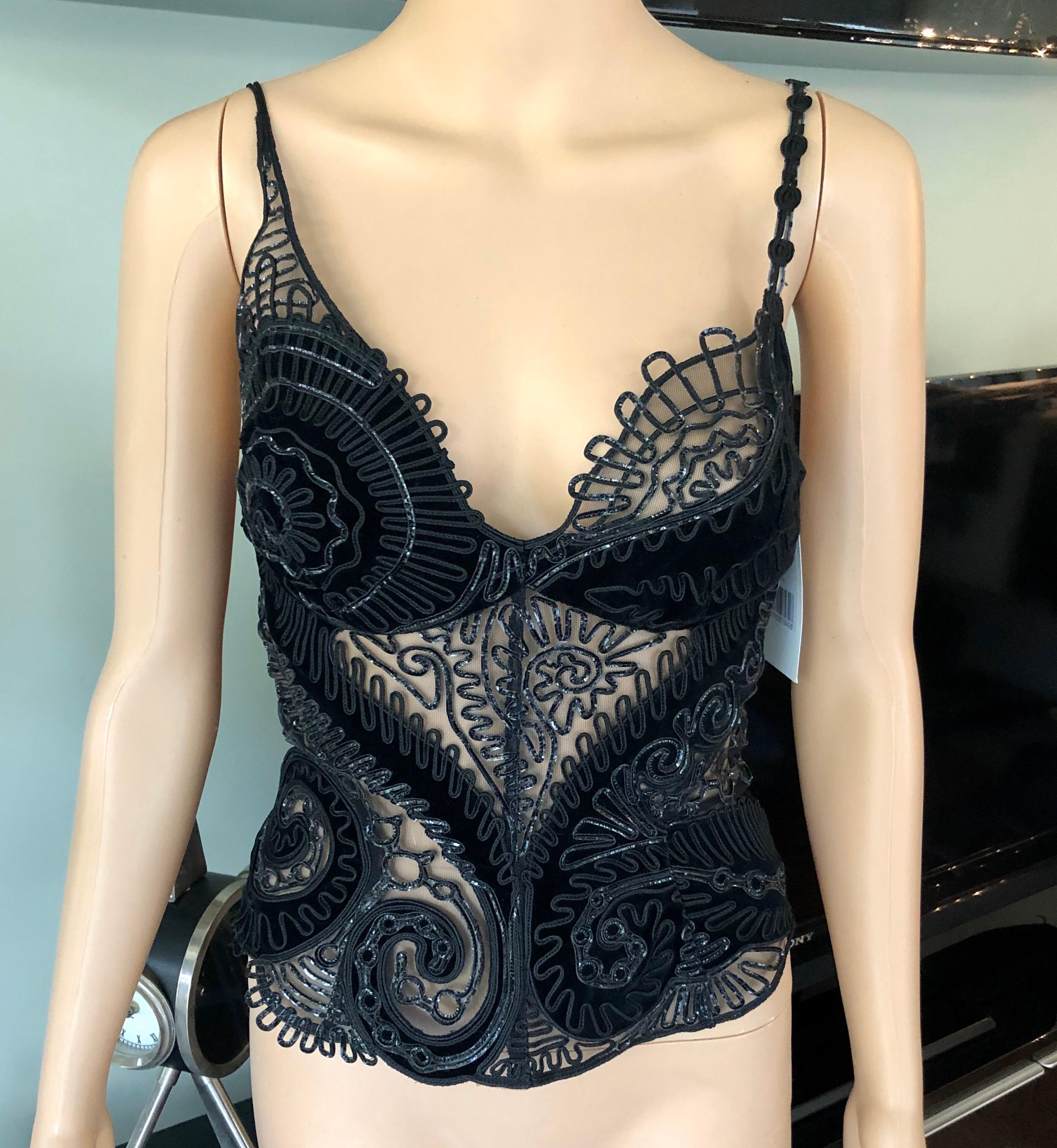 Thierry Mugler Couture Vintage Unworn Embellished Semi-Sheer Black Bustier Top 

Thierry Mugler Couture black bustier top featuring embroidery and sheer mesh throughout, bustier neckline and hook and eye closure at center back.