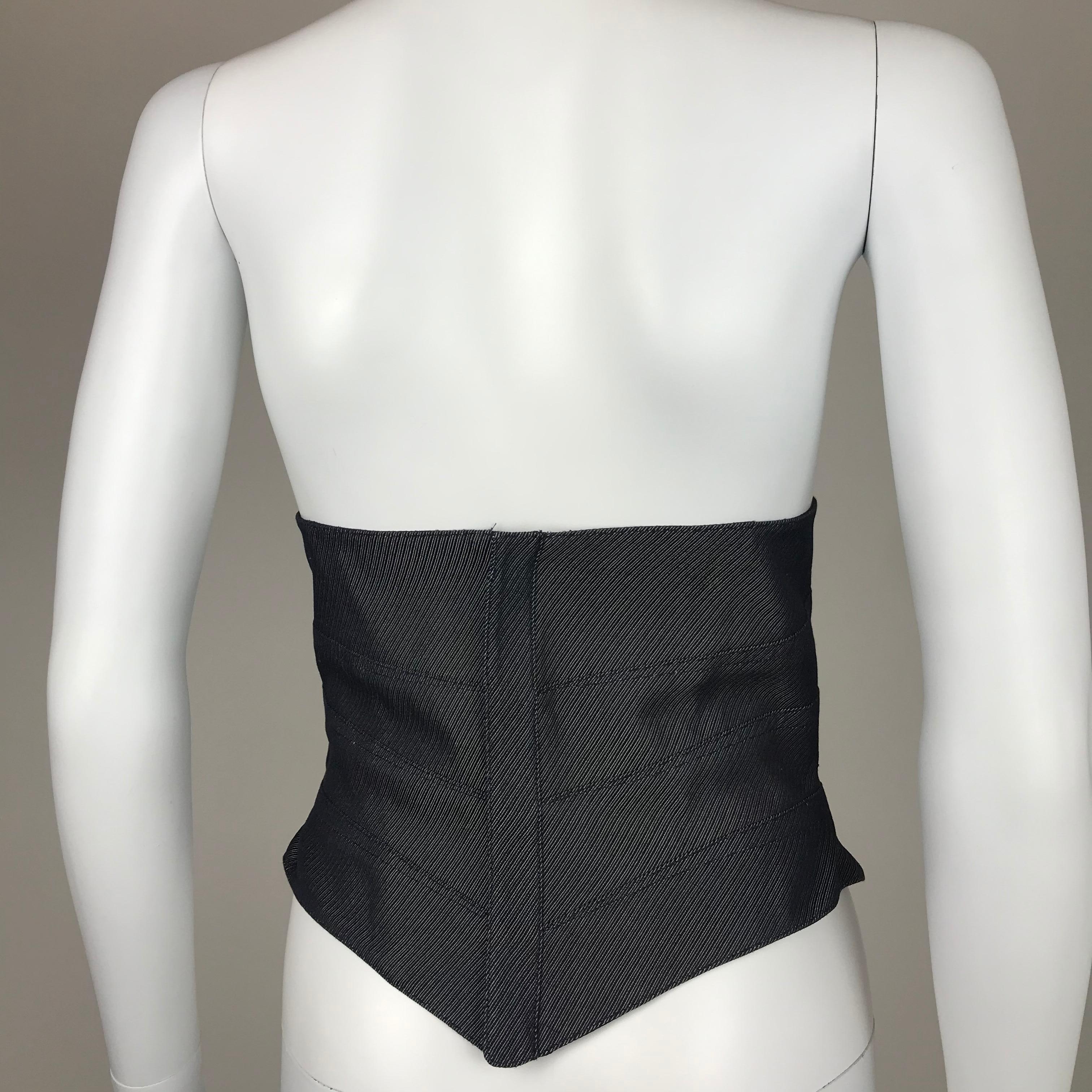 THIERRY MUGLER, Made in France, circa 2000. 
Blue and grey denim effect cotton corset. Dark blue satin lining. 
Closes at the back with a zipper. Fringed lace on the front. 
No size tag but I would recommend it for EU38/40 or Medium.
Please see