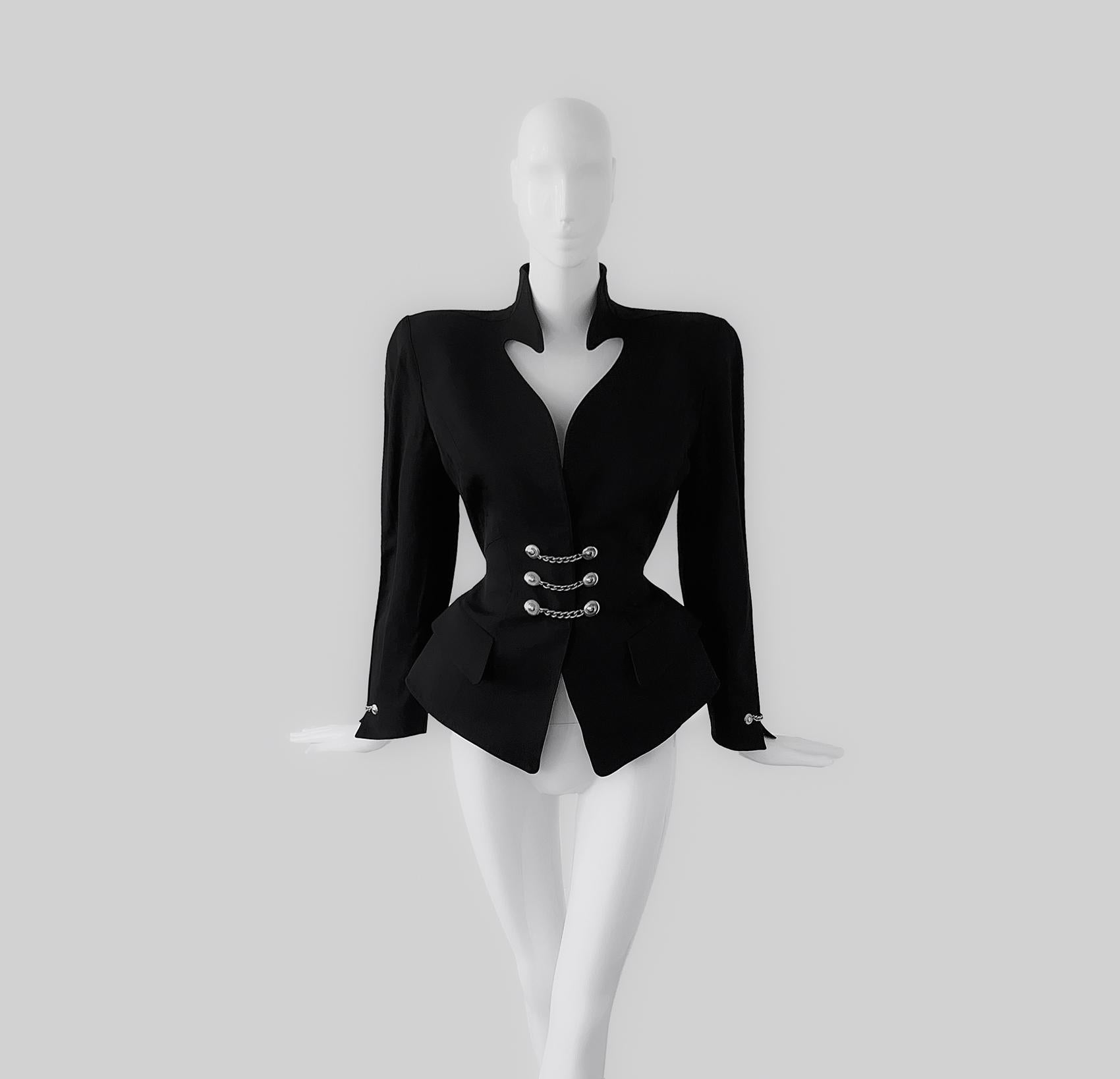 Fabulous rare Thierry Mugler jacket, FW 1990s Collection.

This dramatic sculptural silhouette is truly spectacular. Extremely rare collectors' piece. Iconic Mugleresque hyper feminine shape with fitted waist and exaggerated hips.
Dramatic
