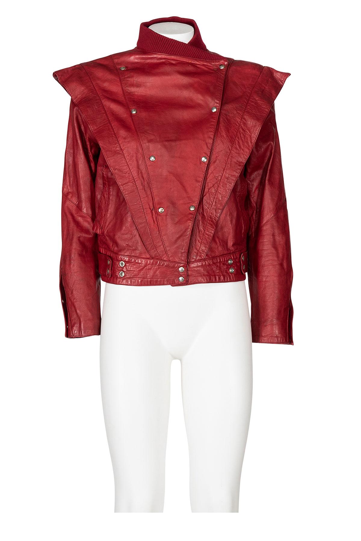 Fall Winter 1997 iconic and rare double breast leather jacket with diagonal cuts by Thierry Mugler.
Ribbed collar.
Snap buttons at front, hem and cuffs.
Fully lined.
The composition is 100% leather.


