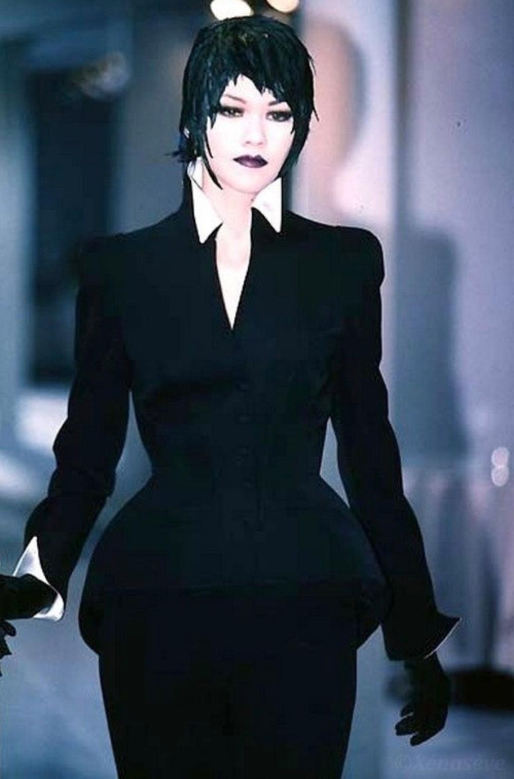 Thierry Mugler Skirt Suit Les Amazones Collection FW 1996.

Luxurious glam jacket by legend Manfred Thierry Mugler. Dramatic silky collar and cuffs, extremely well tailored jacket with fitted feminie shape. Extraordinairy sculptural silhouette -
the