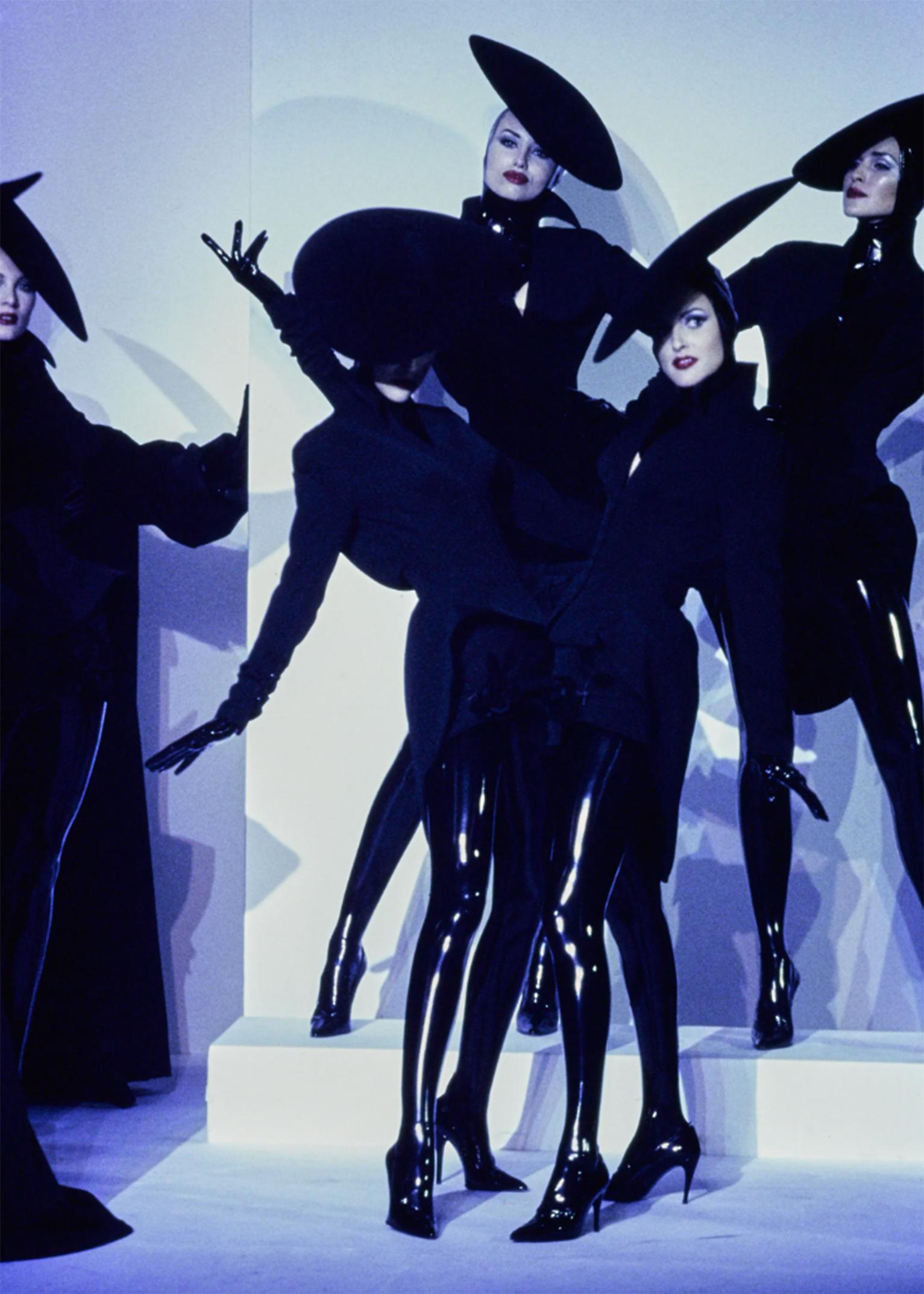 Thierry Mugler Iconic Fall Winter 1995 Couture Runway Hourglass Jacket FR38

Brand: Thierry Mugler
Designer: Thierry Mugler
Collection: Fall / Winter 1995 Couture
Material: Wool
Color: Black
Size: FR38
Made in France

From Thierry Mugler’s iconic