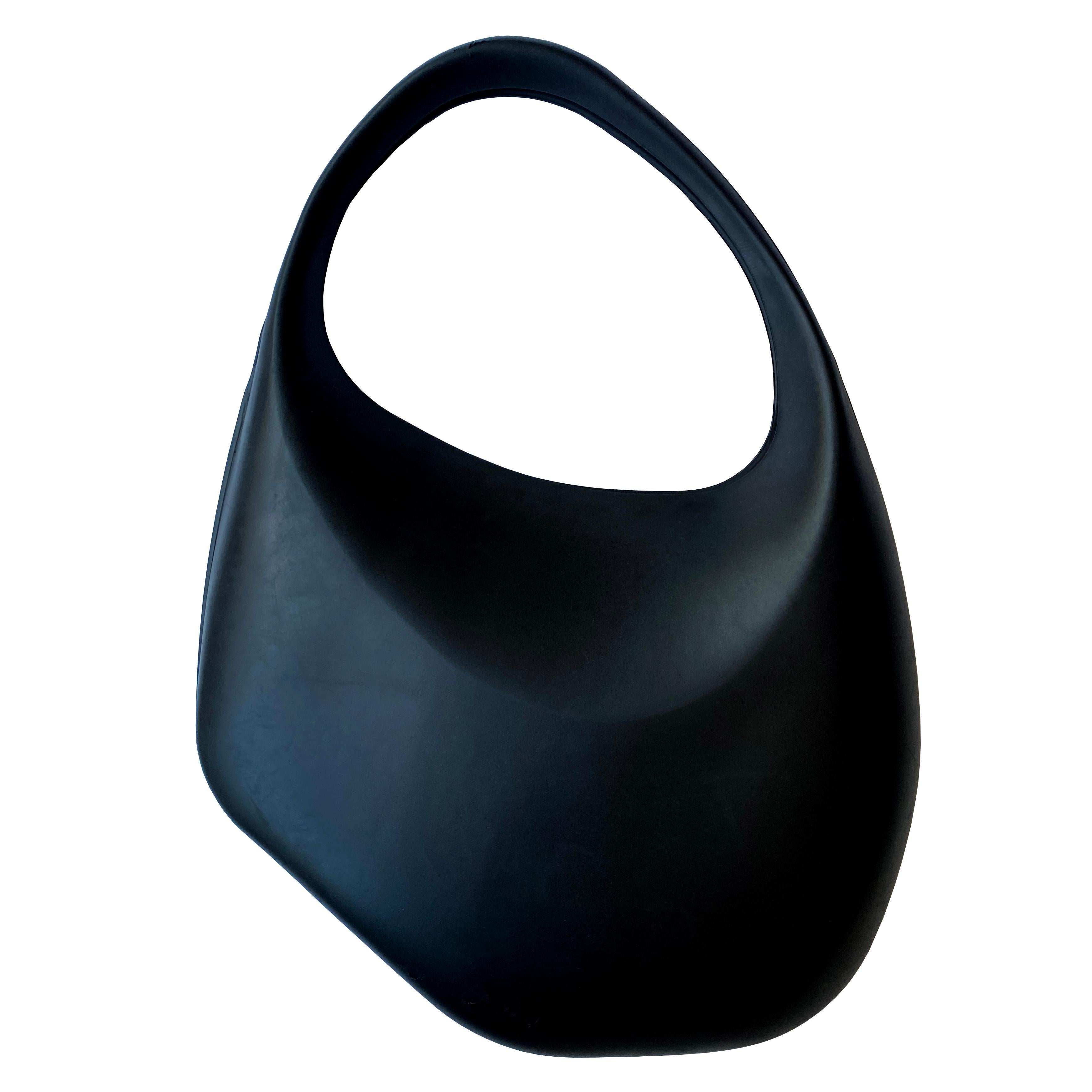 A Thierry Mugler ‘Le Bubble’ Bag, circa 1995-2000. This unique bag has an organic sculptural form, crafted from soft and flexible rubber. The soft rubber construction gives it a distinctive look and feel, setting it apart from traditional handbags.