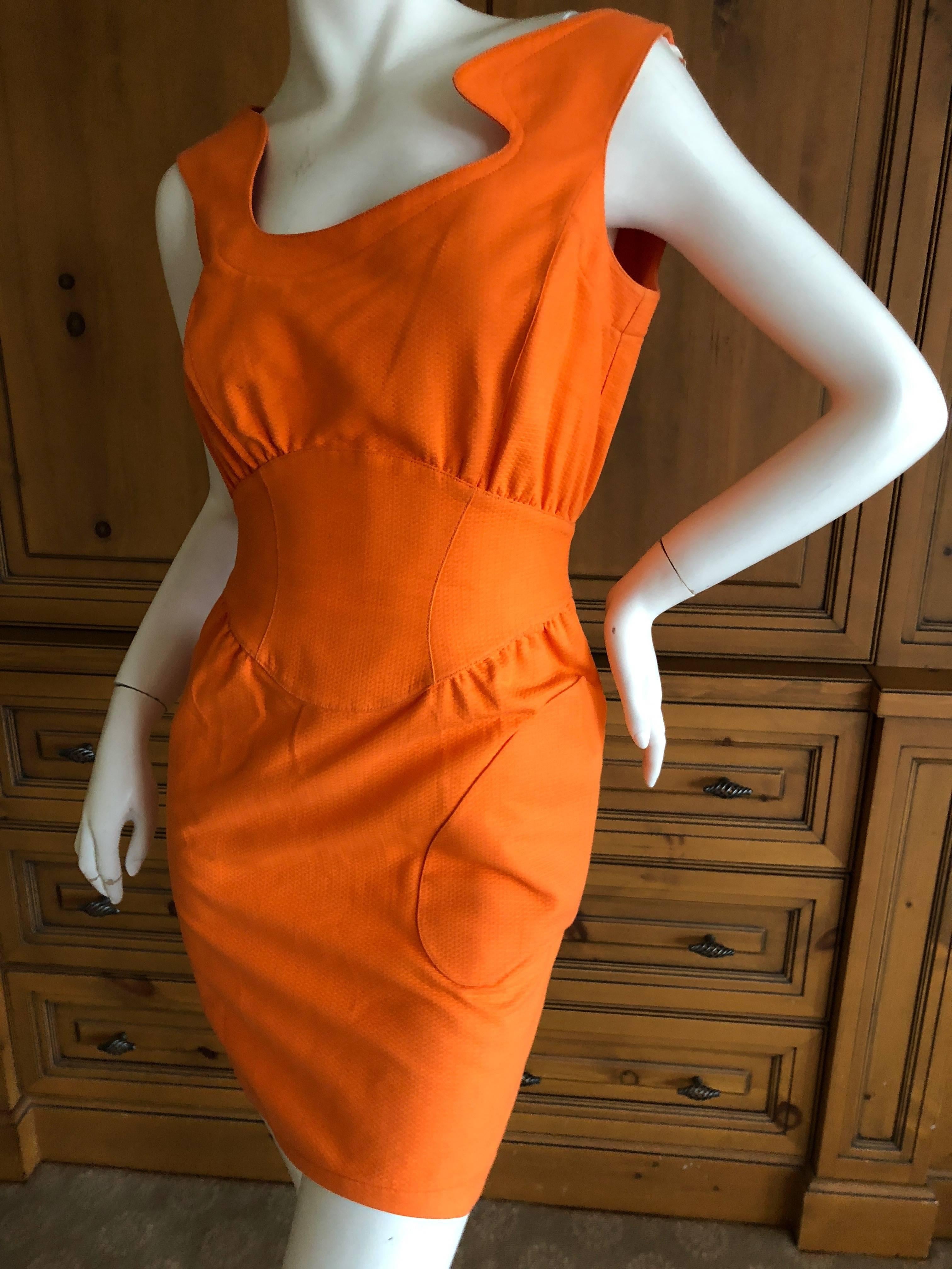 
	
	
Thierry Mugler Mod Vintage 80's Tangerine  Dress.
Snaps down the back.
Size 38

Bust 38