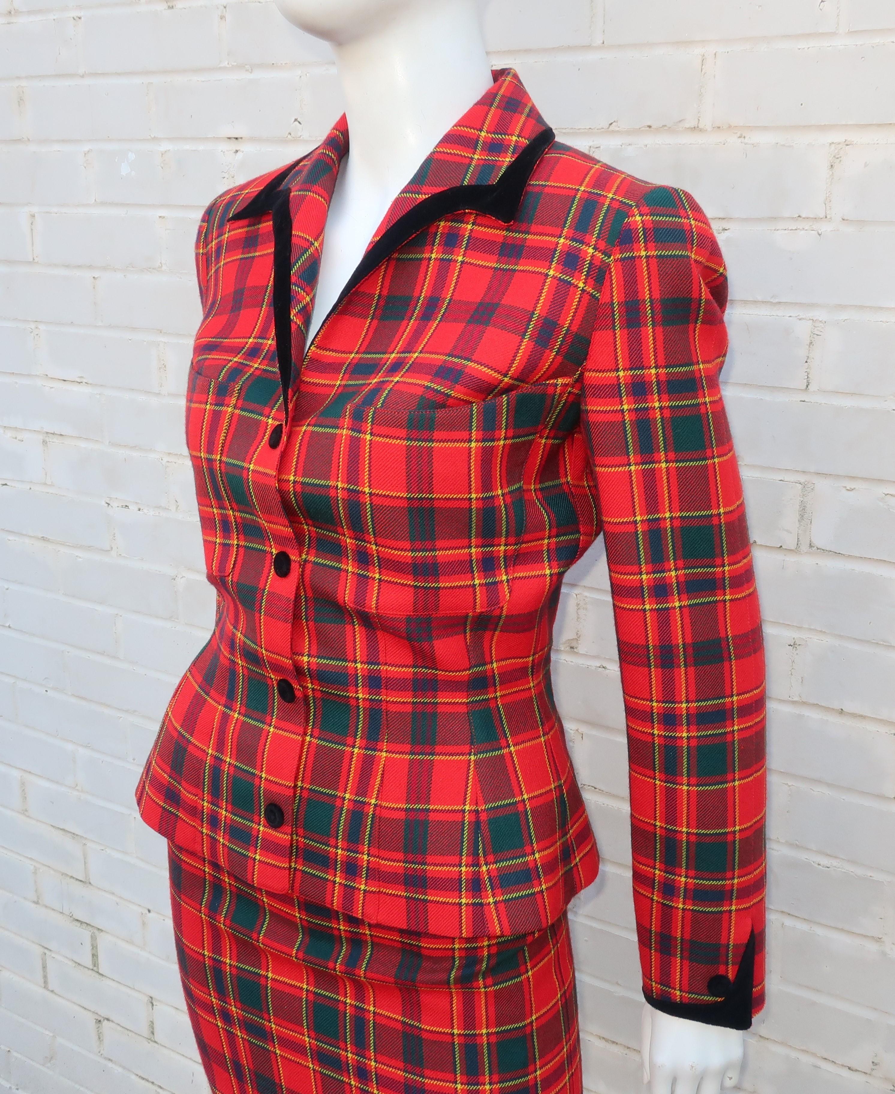 French designer Thierry Mugler is a master of the innovative suit combining style details from the 1940's with a futuristic silhouette which honors the strong feminine form.  This lightweight wool suit is a fun combination of bright red plaid and