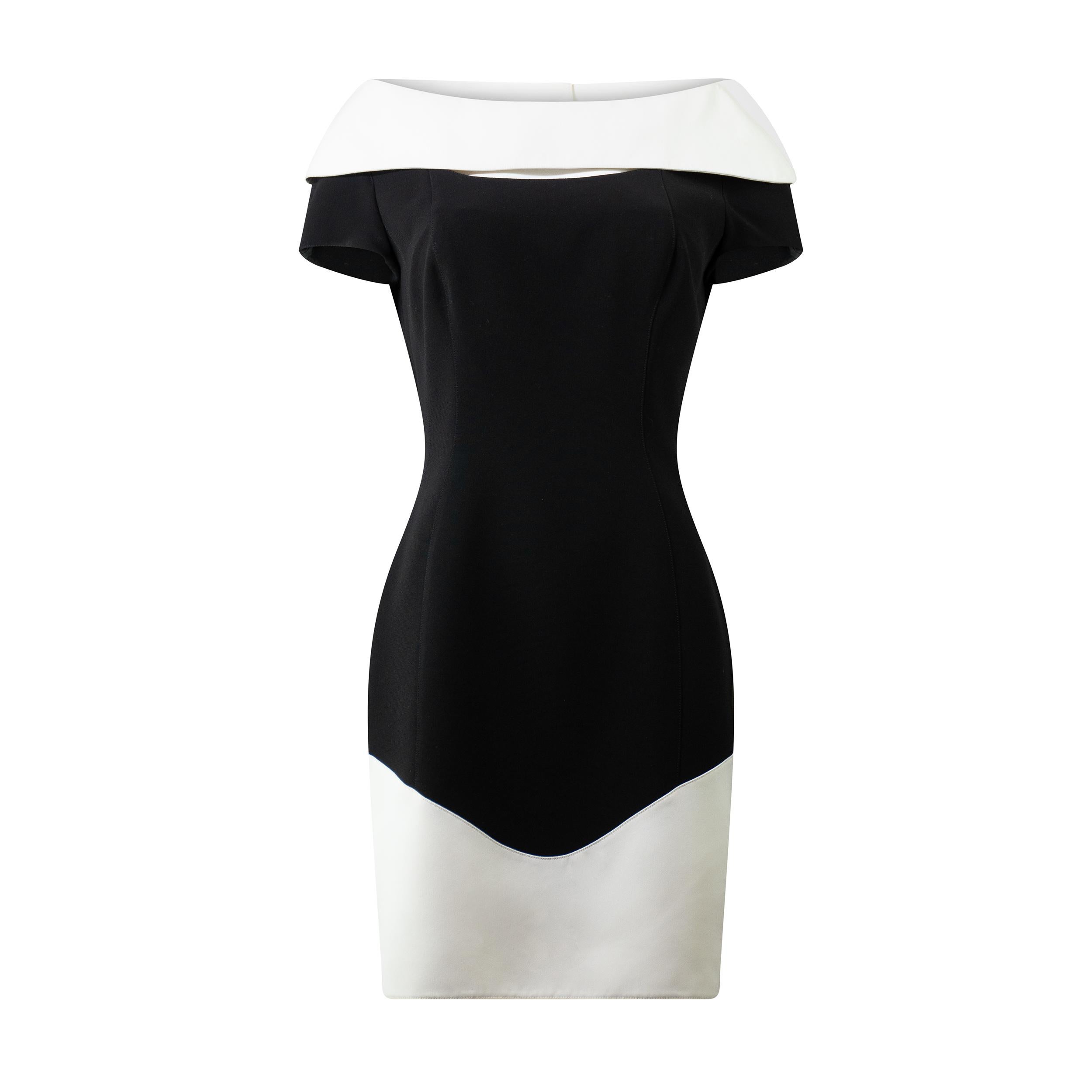 Thierry Mugler Spring Summer 1996 Rare Vintage Sculptural Hourglass Dress FR40

Brand: Thierry Mugler
Designer: Thierry Mugler
Collection: Spring / Summer 1996
Material: Rayon / Polyester
Color: Black / White
Size: FR40
Made in France

From Thierry