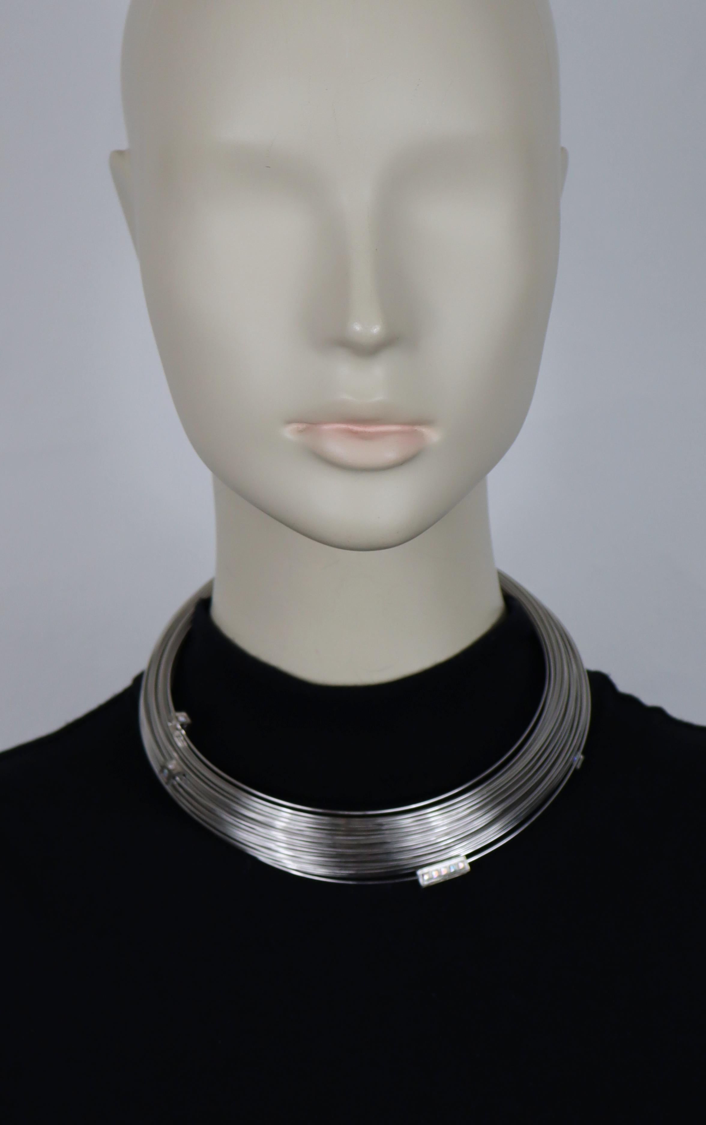 THIERRY MUGLER silver tone choker necklace made of bundled wires, featuring mobile elements embellished with aurora borealis colour crystals.

Embossed TM.

Indicative measurements : circumference approx. 39.89 cm (15.70 inches) / neck opening