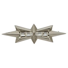 Retro Thierry Mugler Silver Tone Star Brooch with Emerald Cut Rhinestones